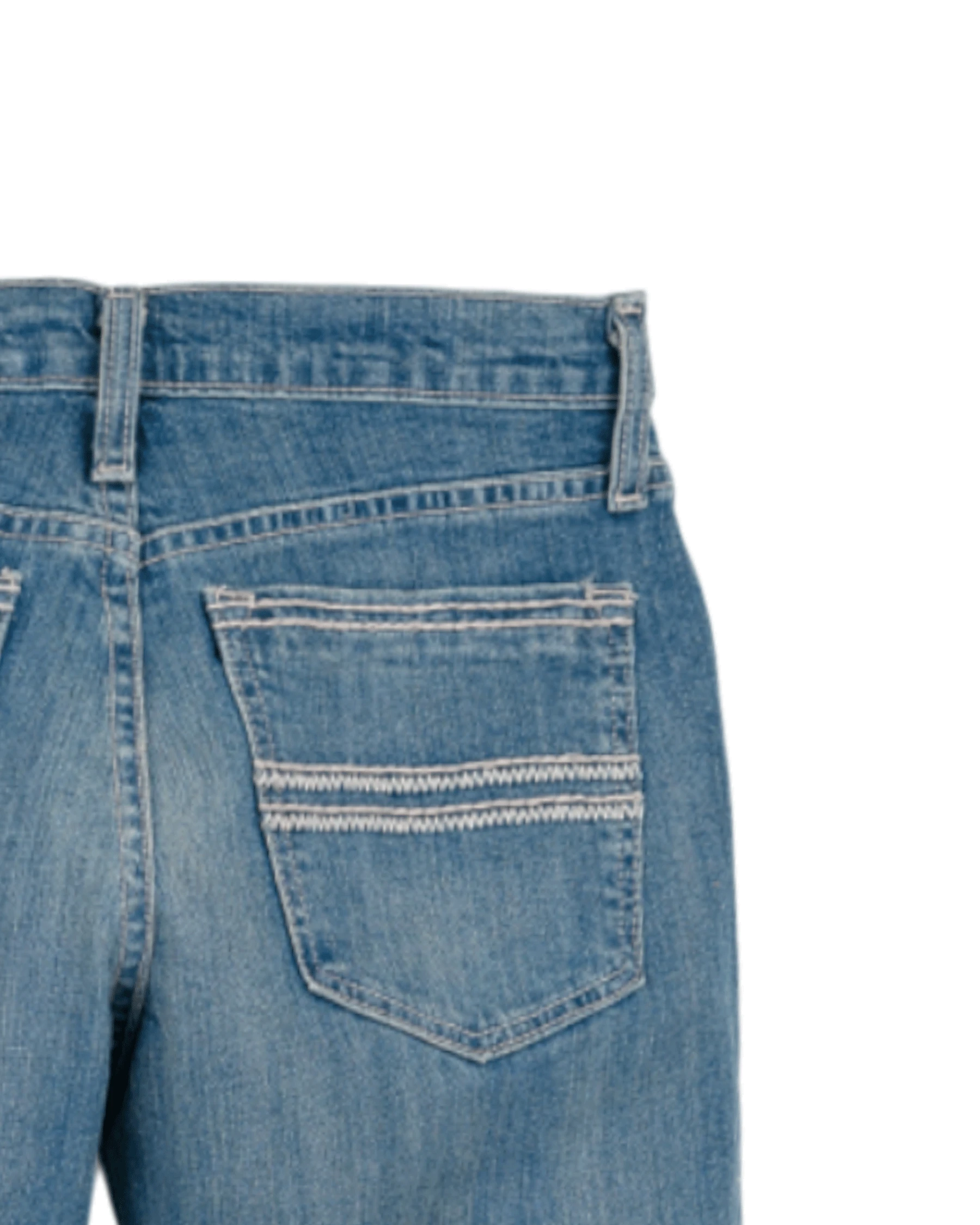 Close-up of blue jeans with a pocket on a white background