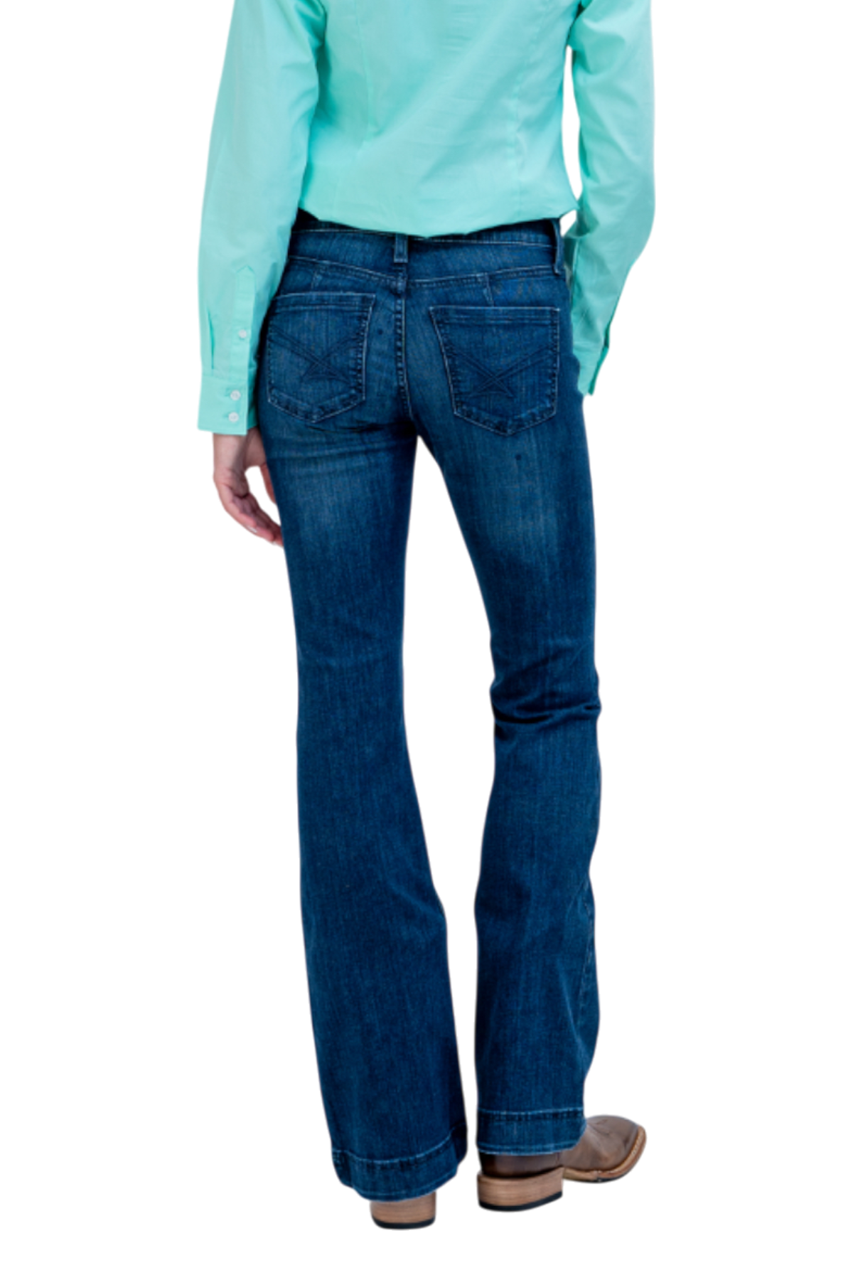 Person wearing blue jeans and a light blue shirt on a white background