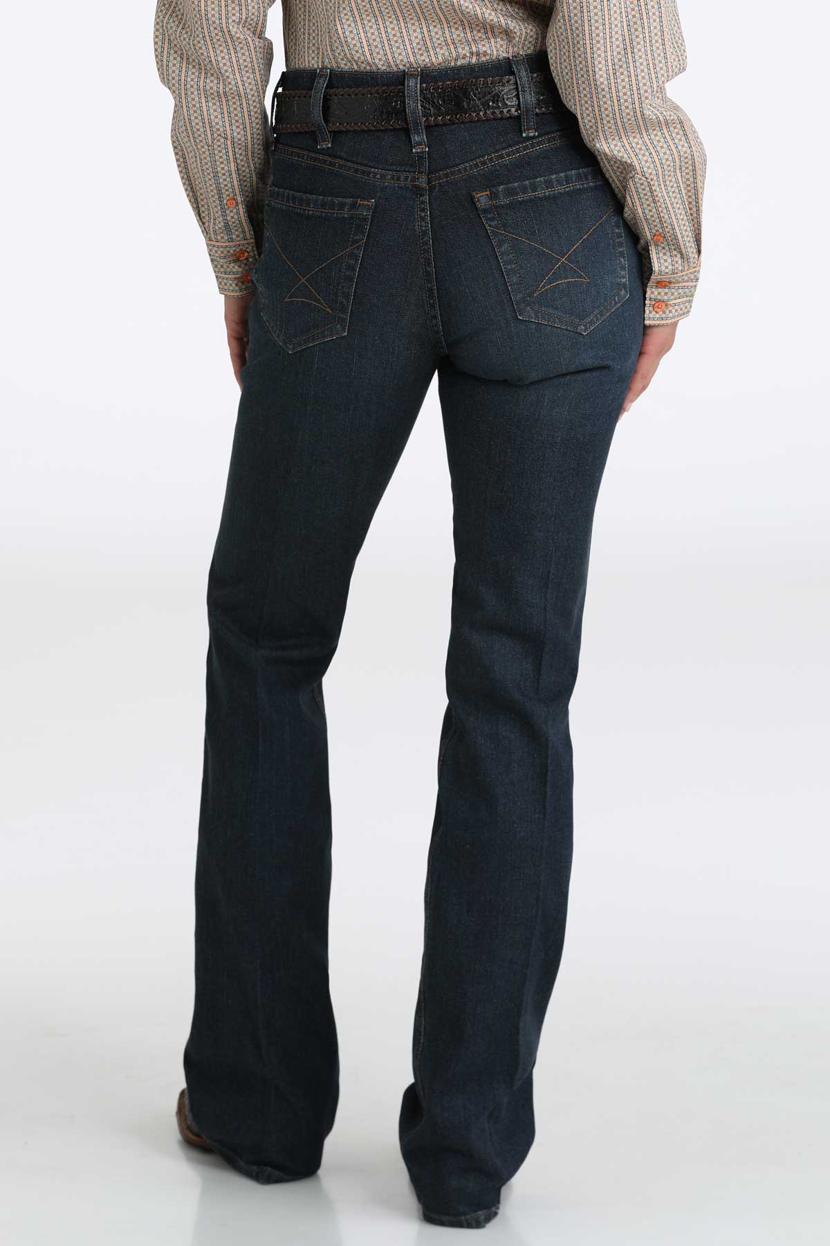 Back view of Cinch ladies’ boot cut jeans in a dark wash showing the classic fit