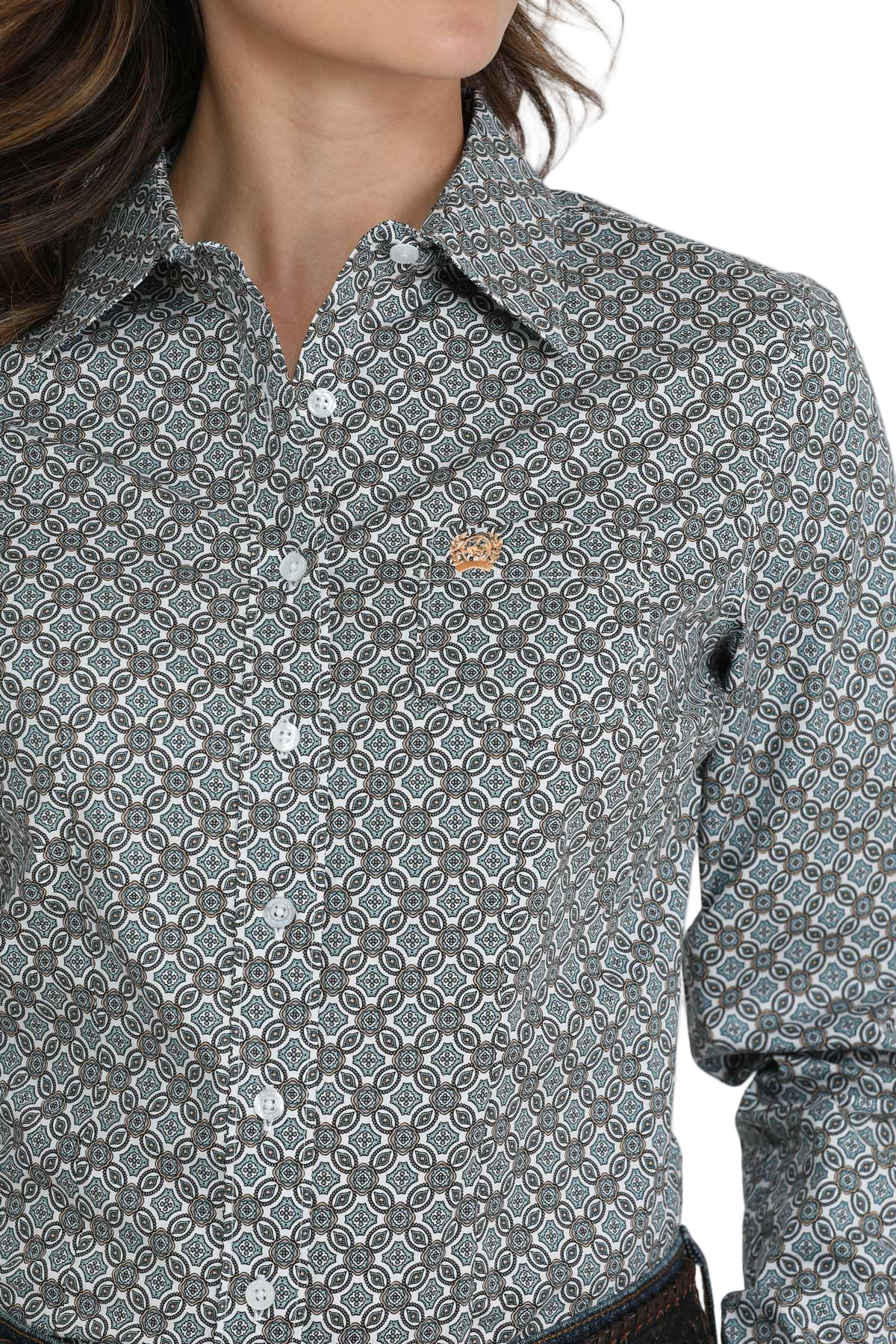 Close-up of a woman wearing a long-sleeve patterned button shirt