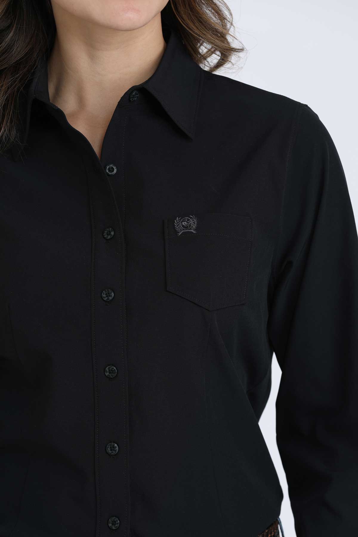 Black shirt with a brand logo on a white background