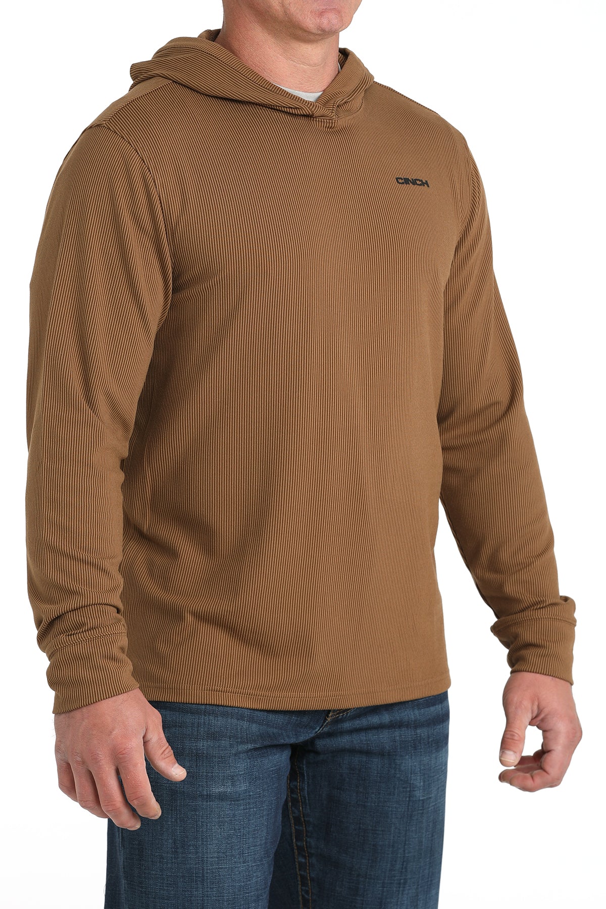 Man wearing a brown hooded sweatshirt with a visible brand logo on a white background