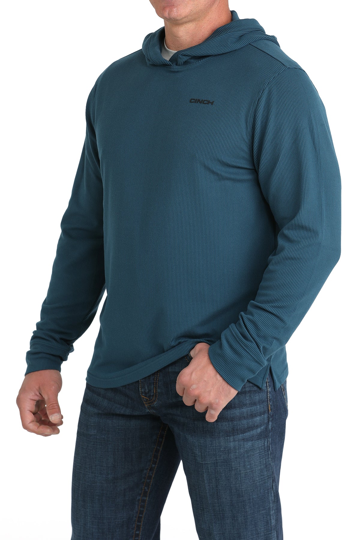 Man wearing a blue hoodie with a visible brand logo on a white background