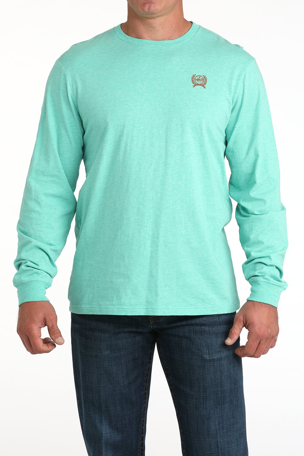 Person wearing a light blue long-sleeve shirt with a small logo on a white background
