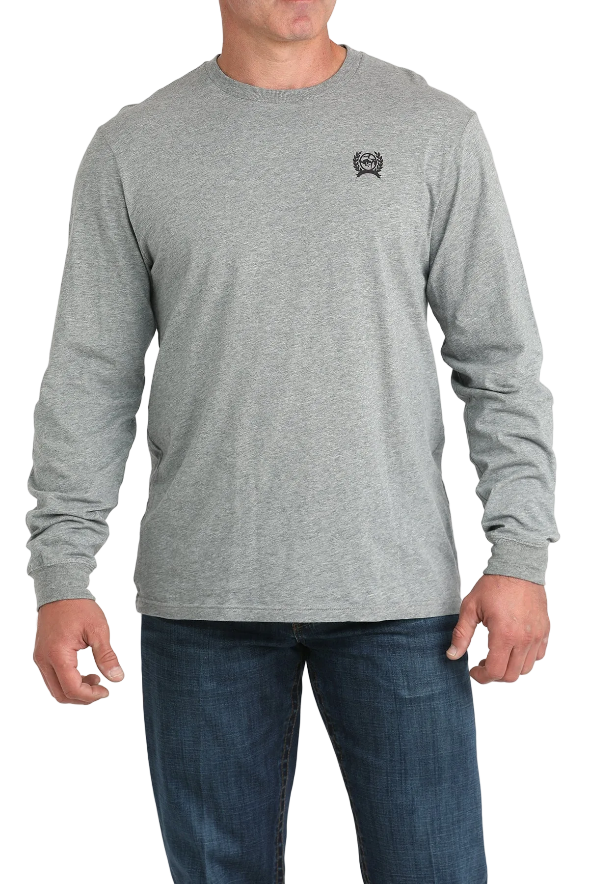 A man wearing a gray long-sleeve shirt and dark jeans stands against a transparent background.