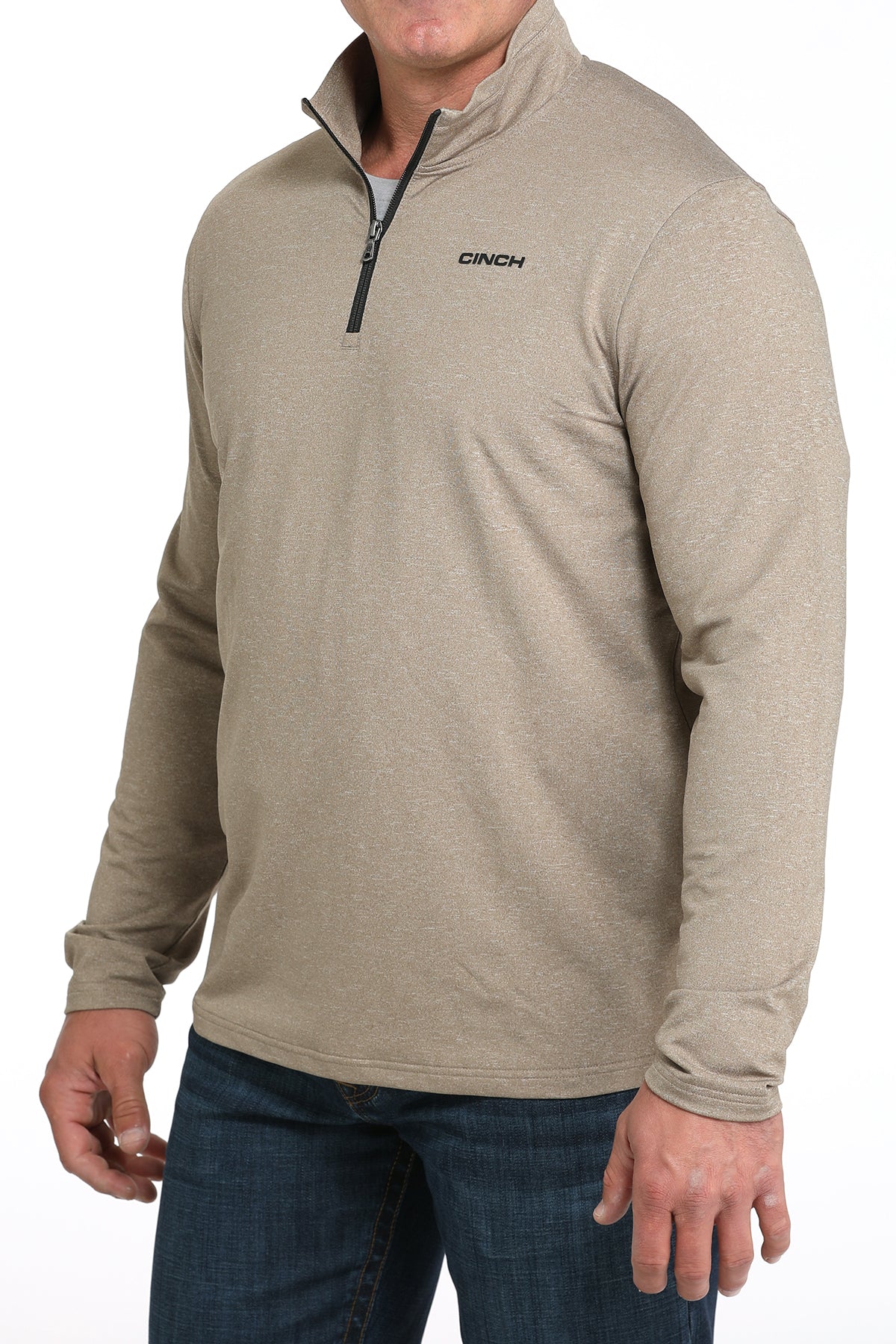 Man wearing a beige long-sleeve pullover with a brand logo on a white background