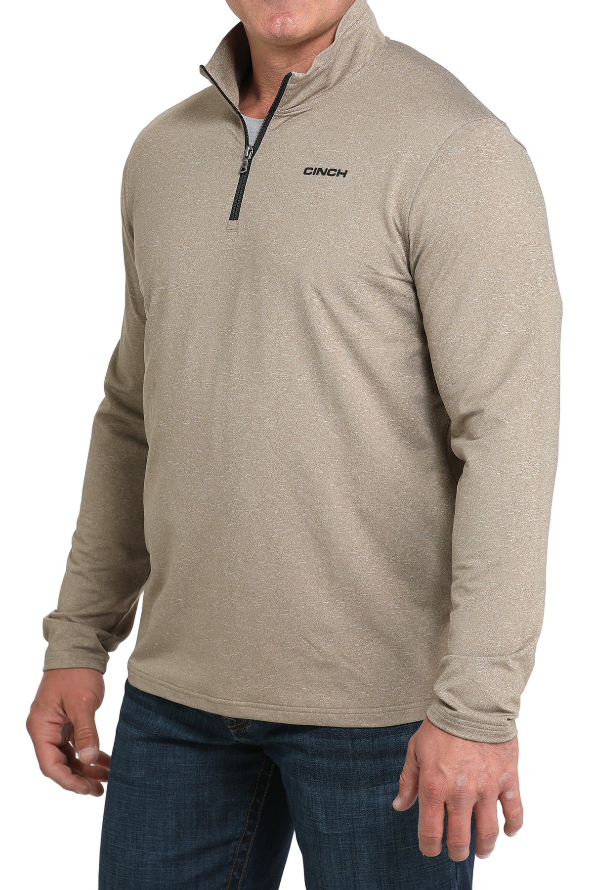 Man wearing a beige quarter-zip sweater and jeans on a transparent background