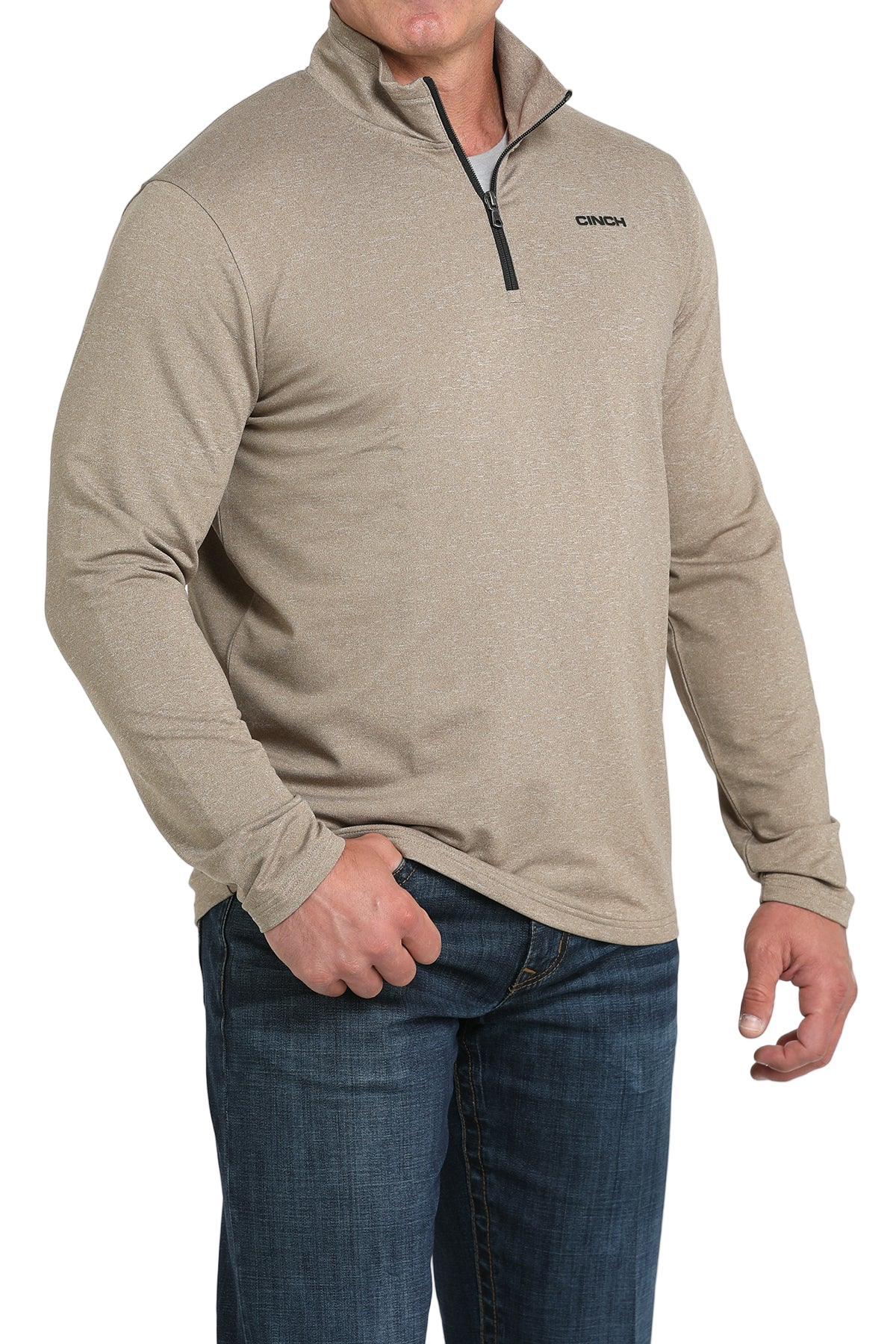 Man wearing a beige quarter-zip sweater and jeans on a transparent background