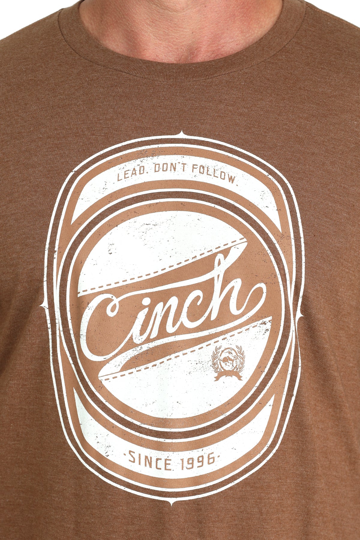 Brown t-shirt with 'Cinch' logo and text on a plain background