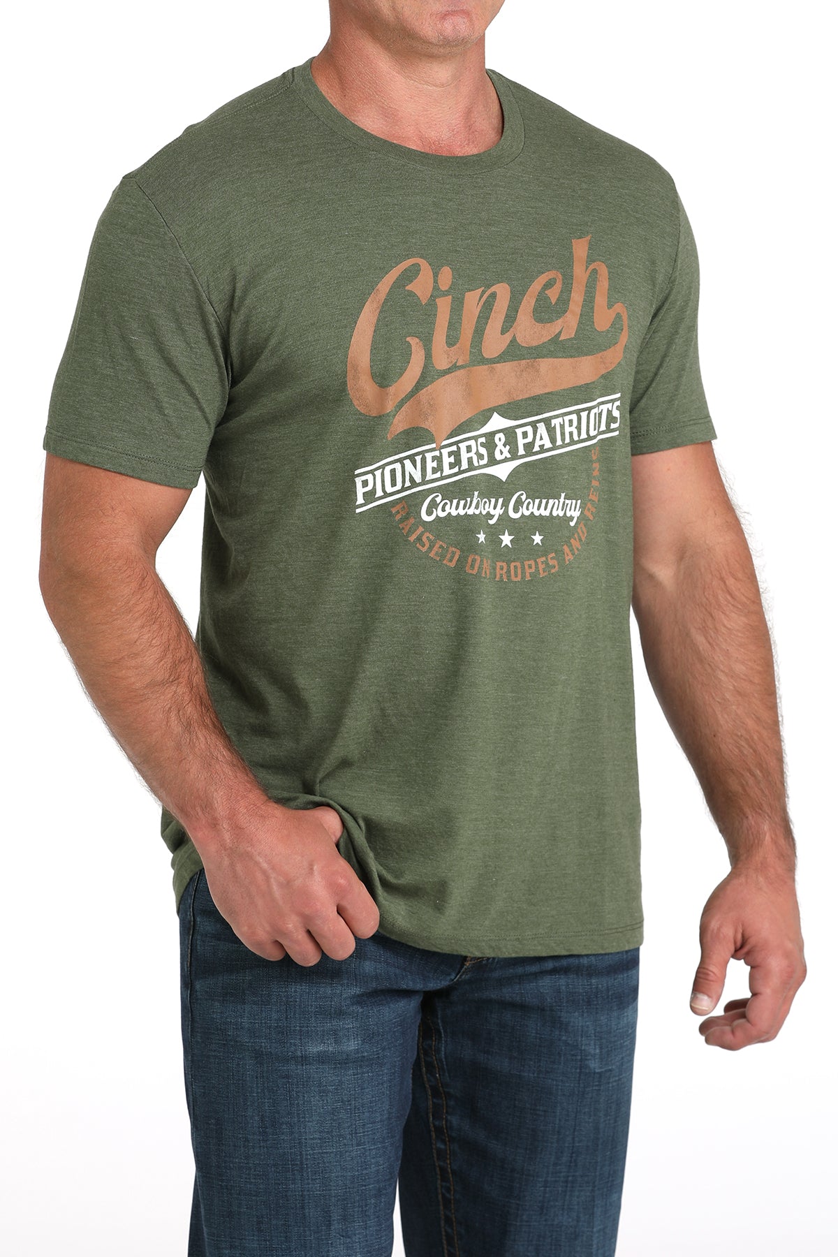 Man wearing a green t-shirt with 'Cinch' branding on a white background