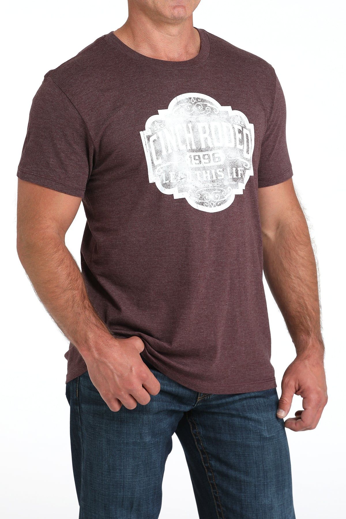 Man wearing a maroon t-shirt with a white graphic design on a white background
