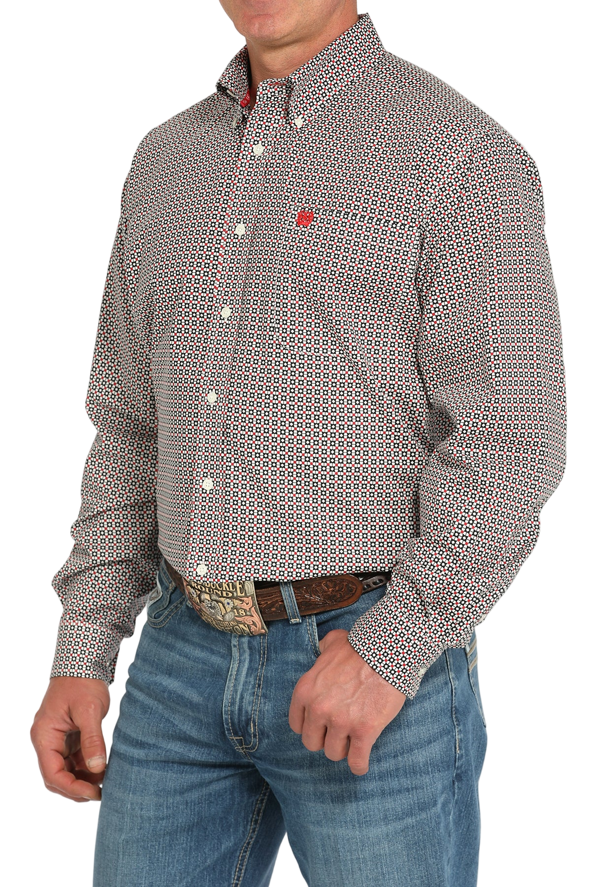 Man wearing a patterned multi-color long sleeve button-down shirt and jeans on a transparent background