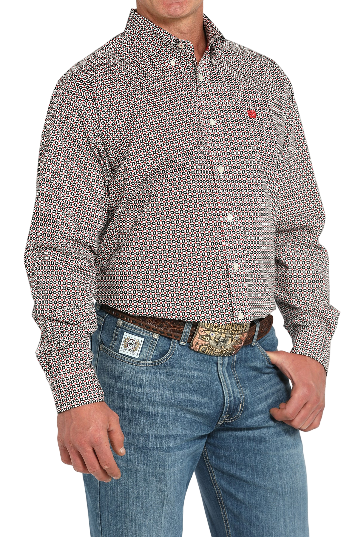 Man wearing a patterned multi-color long sleeve button-down shirt and jeans on a transparent background