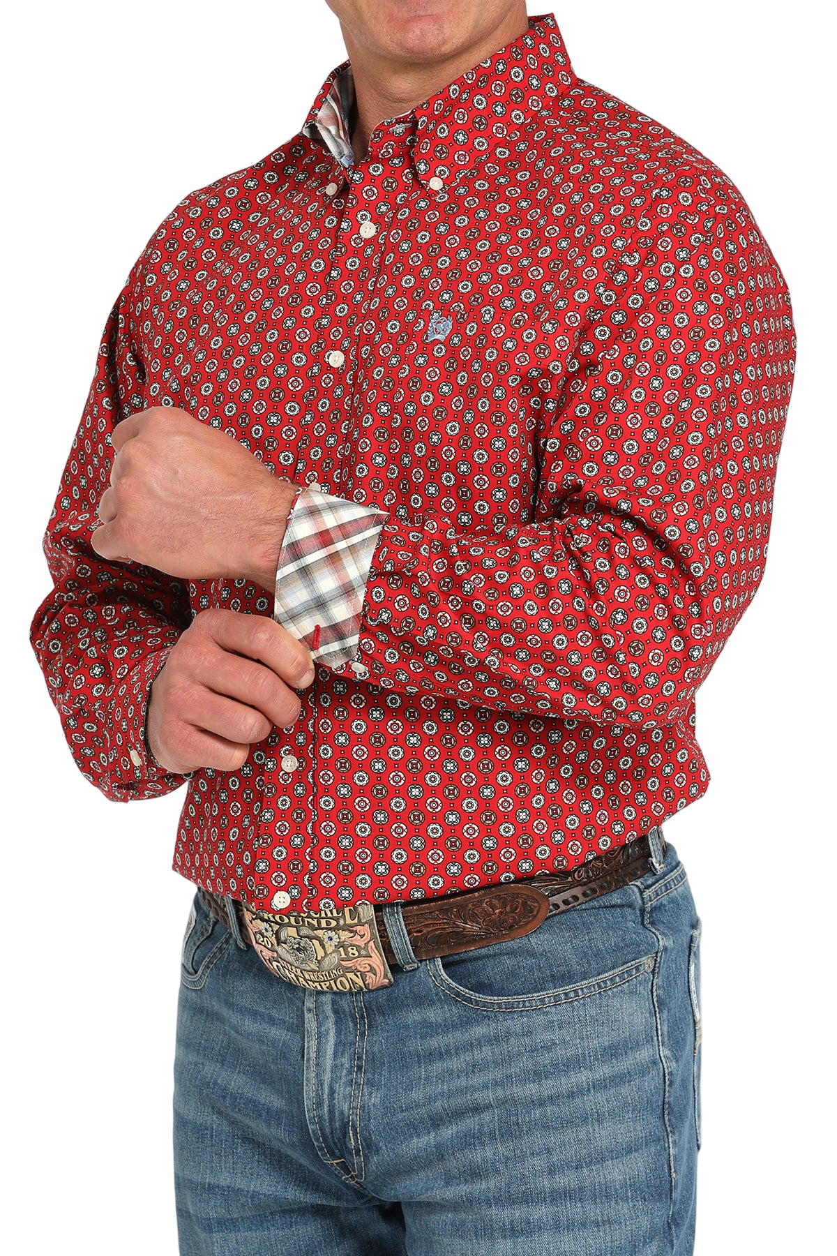 Man wearing a patterned red long sleeve button-down shirt with contrasting cuffs and jeans on a transparent background