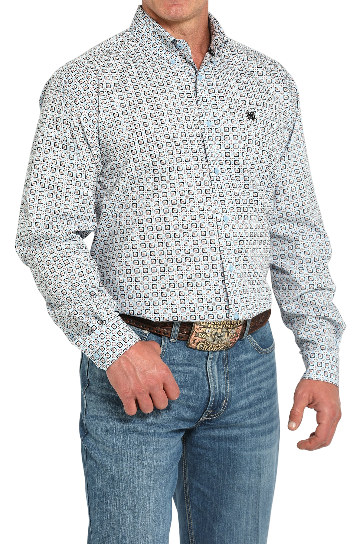 Man wearing a patterned long sleeve button-down shirt and jeans on a transparent background