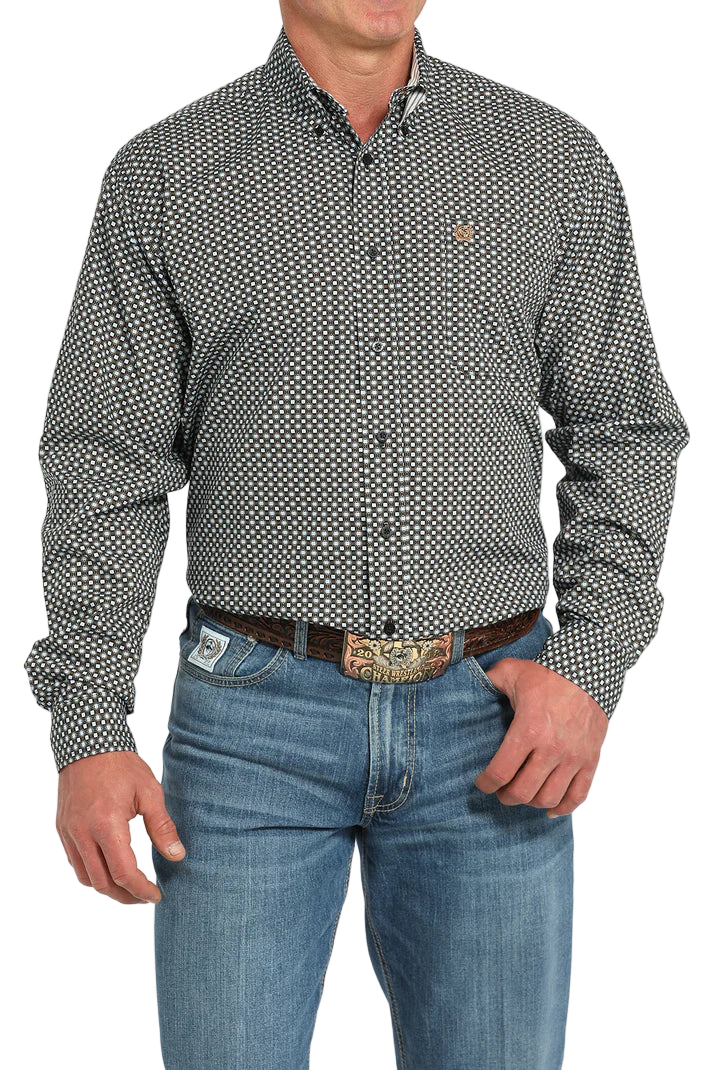 Man wearing a patterned gray long sleeve button-down shirt and jeans on a transparent background