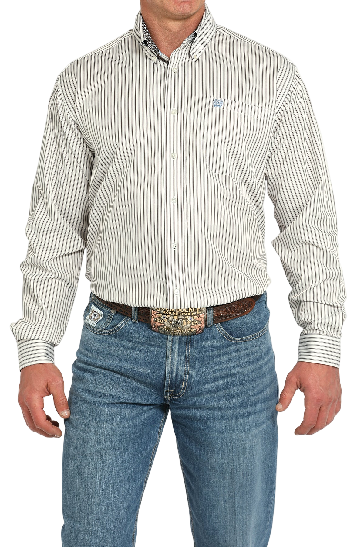 Man wearing a light gray button-up shirt and blue jeans on a white background
