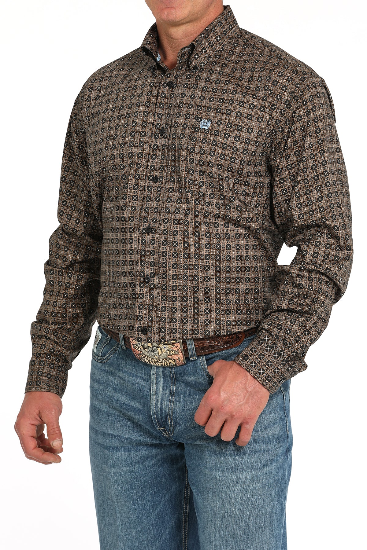 Man wearing a brown long sleeve button-down shirt with jeans and a belt