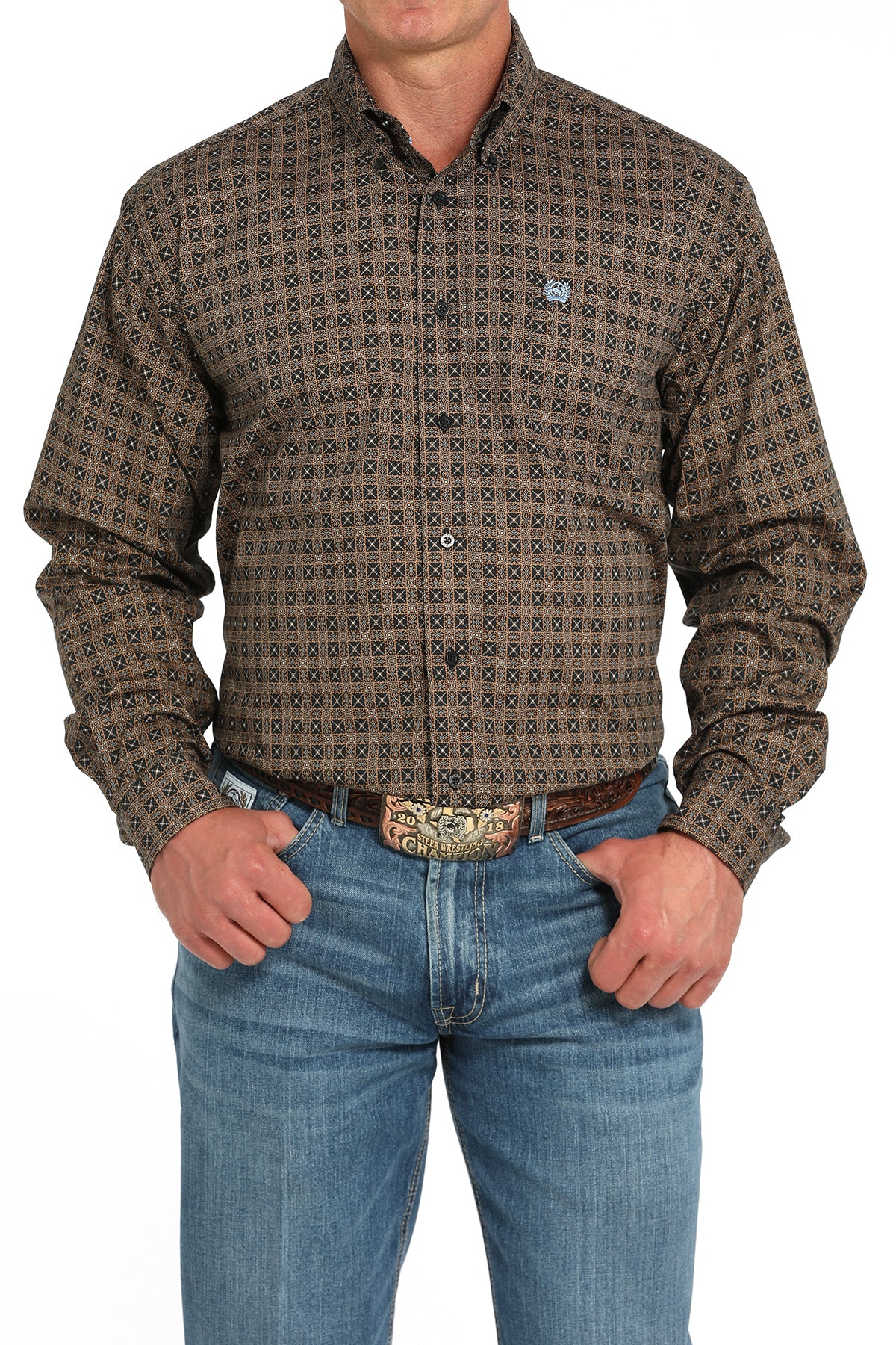 Man wearing a brown long sleeve button-down shirt with jeans and a belt