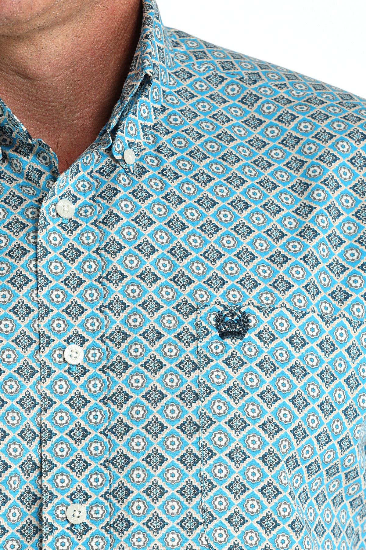 Close-up of a patterned shirt with blue and black design
