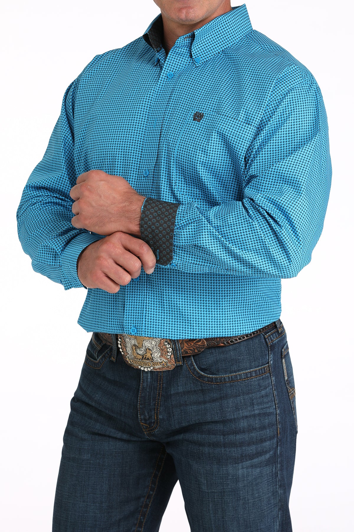 Person wearing a blue checkered shirt and jeans on a white background