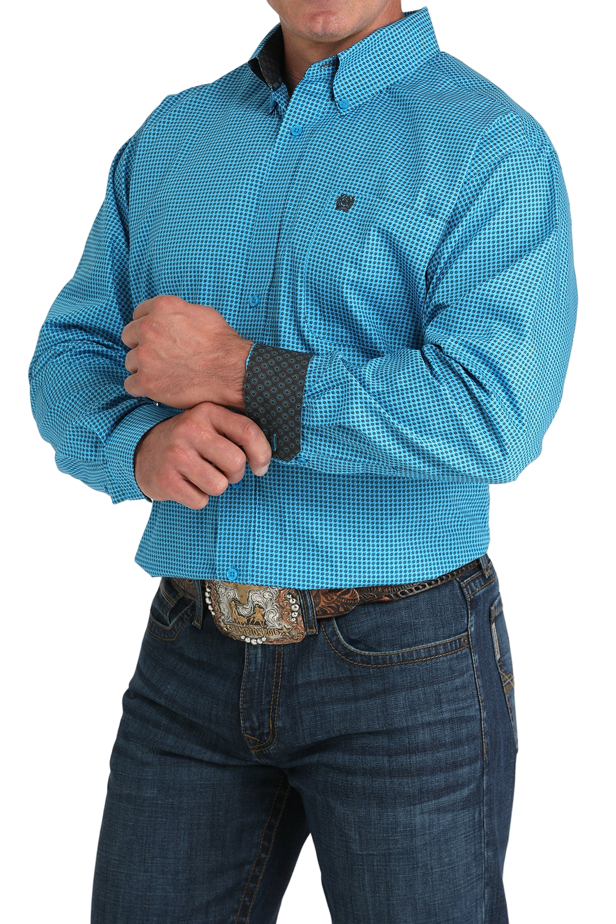 Man wearing a patterned blue long sleeve button-down shirt with contrasting cuffs and jeans on a transparent background