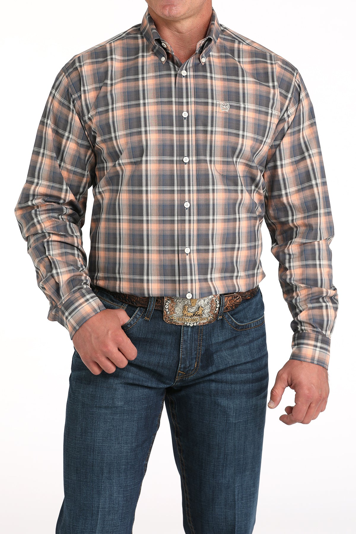 Man wearing a plaid shirt and jeans on a white background
