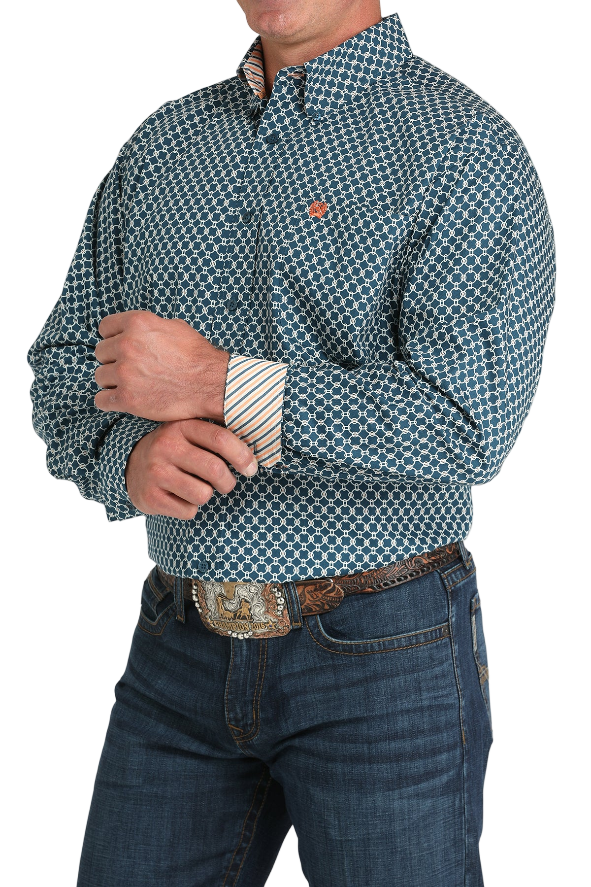 Man wearing a patterned teal long sleeve button-down shirt with contrasting cuffs and jeans on a transparent background