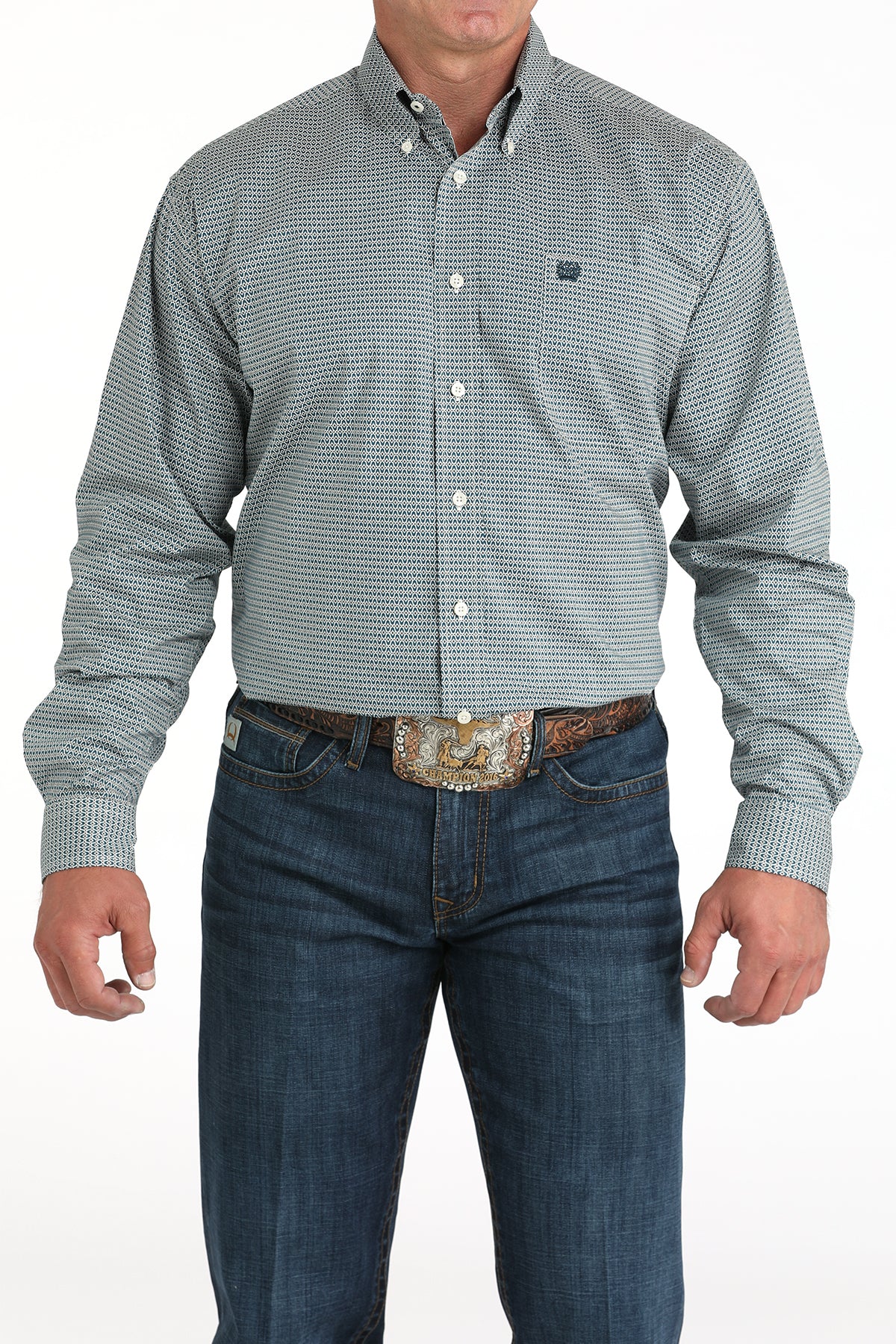 Man wearing a green checkered shirt and blue jeans on a white background