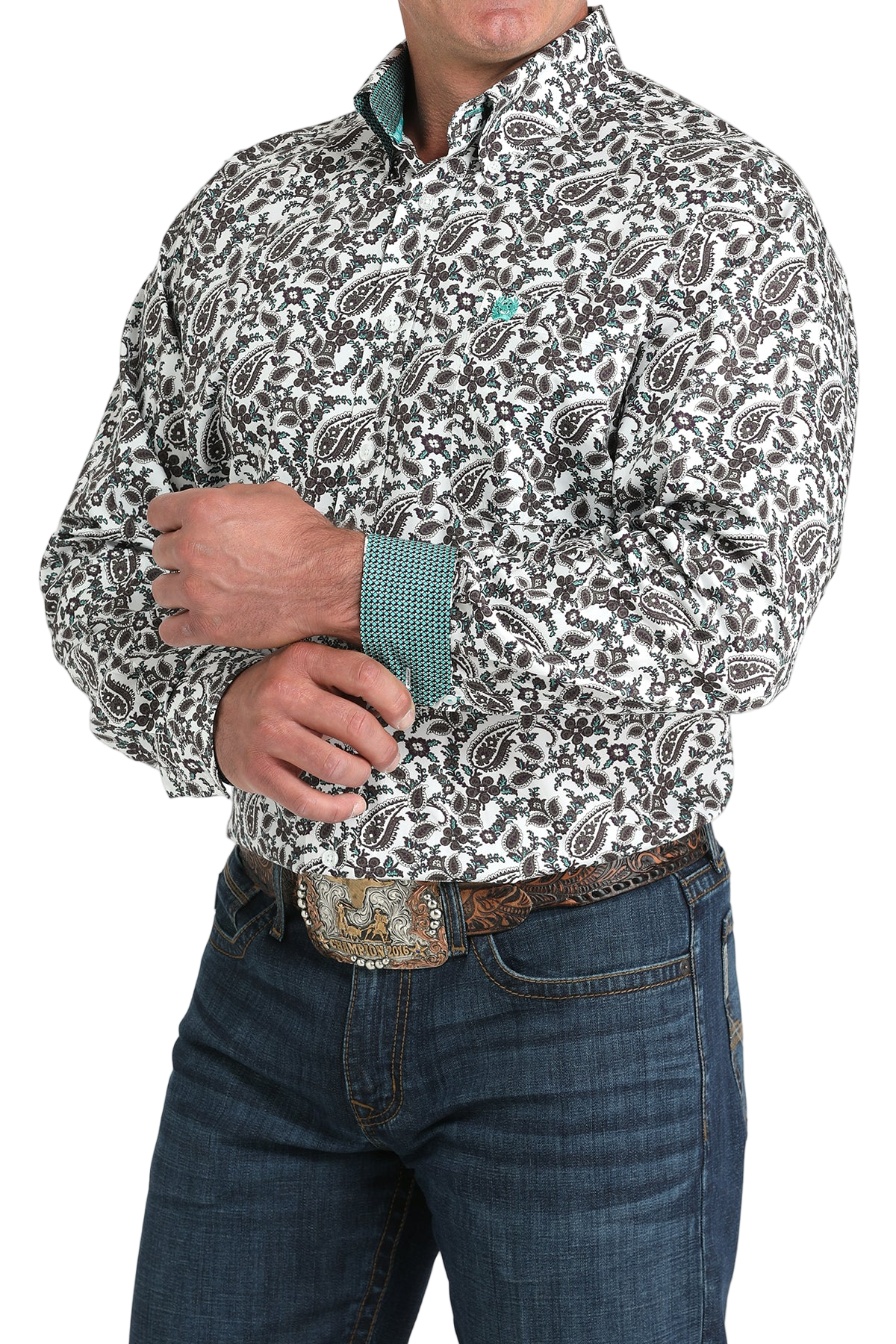 Man wearing a patterned multi-color long sleeve button-down shirt with contrasting cuffs and jeans on a transparent background