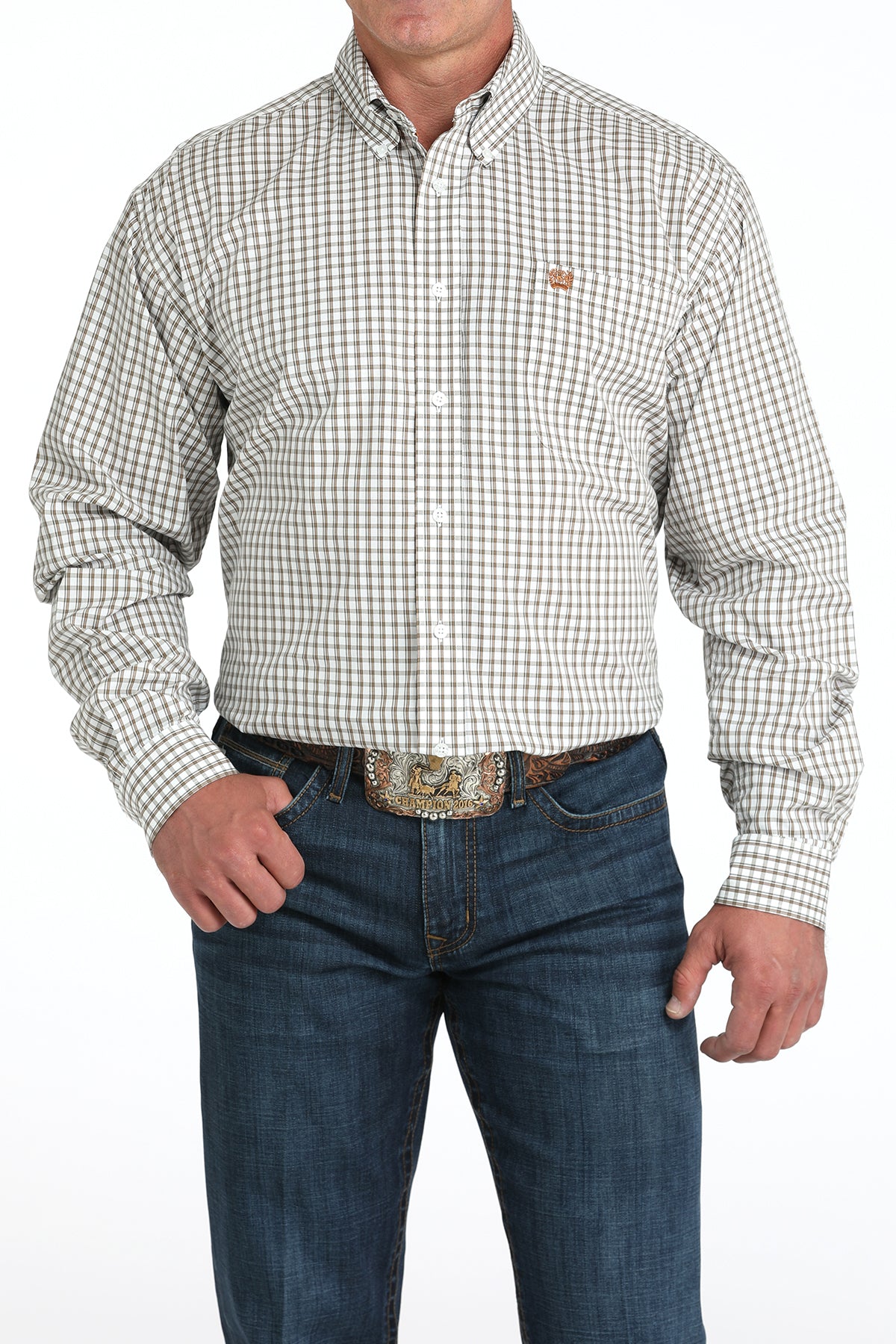 Man wearing a white plaid long sleeve button-down with jeans and a belt