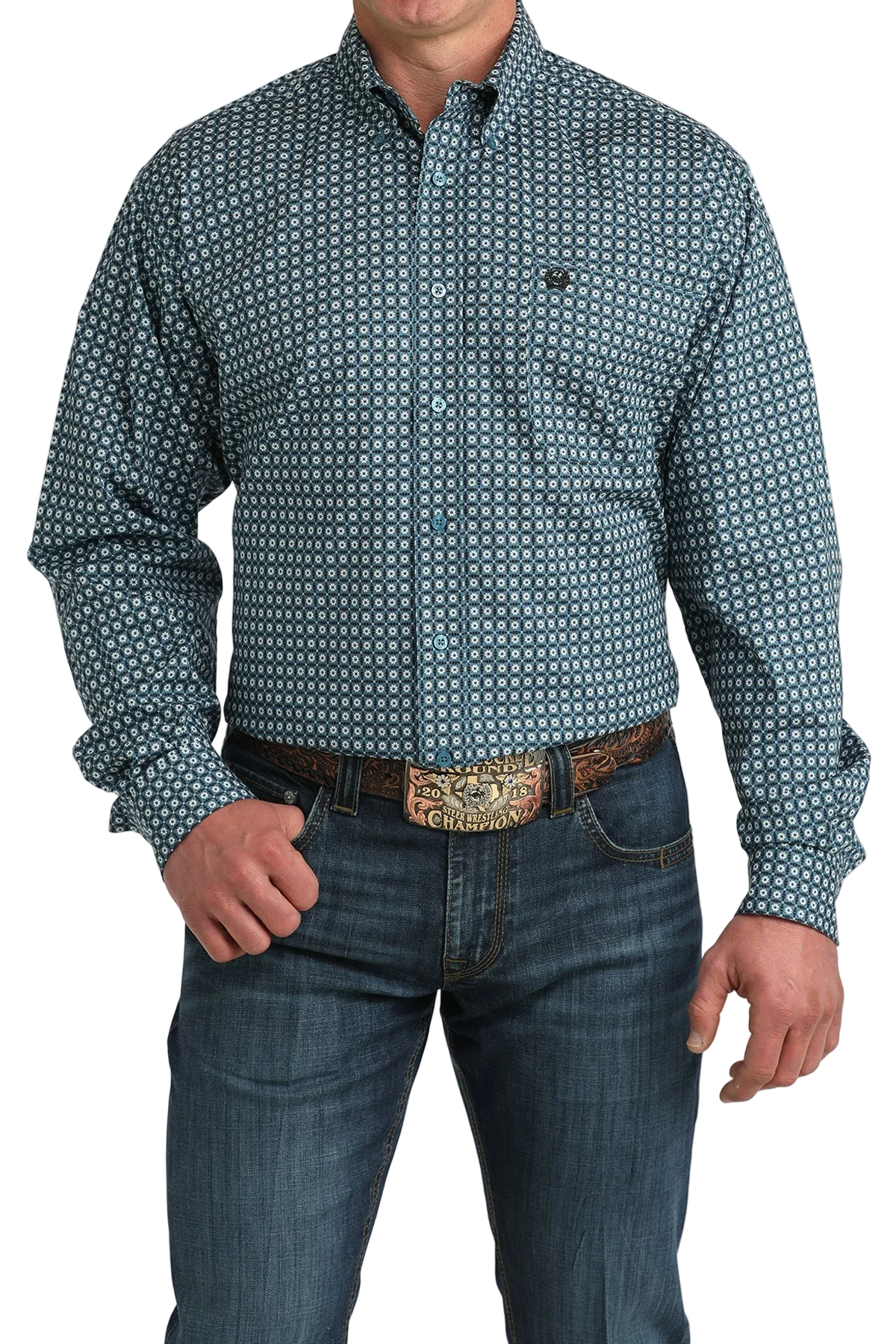 Man wearing a patterned blue shirt and jeans on a white background