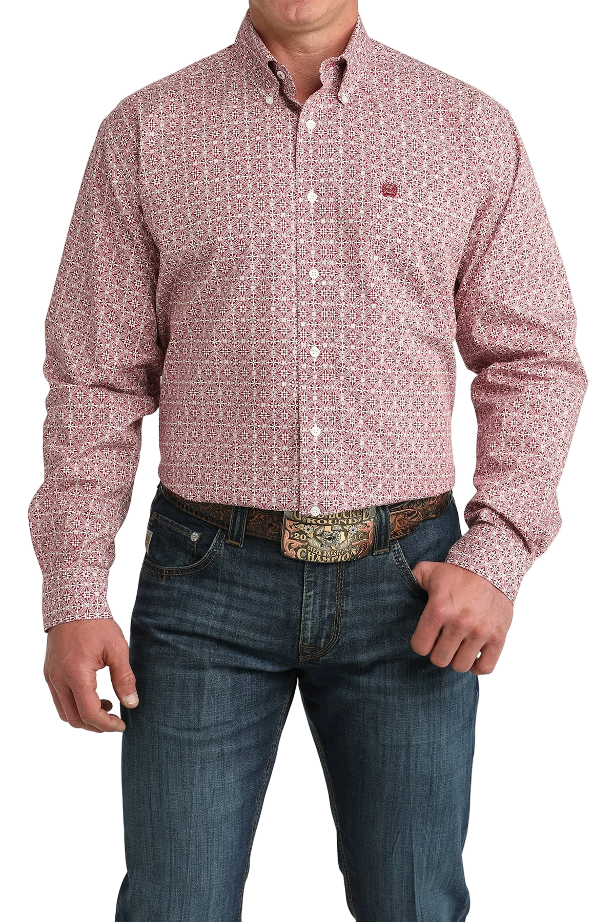 Man wearing a patterned red shirt and jeans on a white background