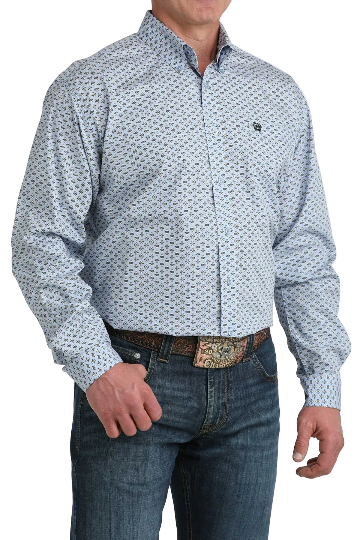 Man wearing a patterned shirt and jeans on a white background