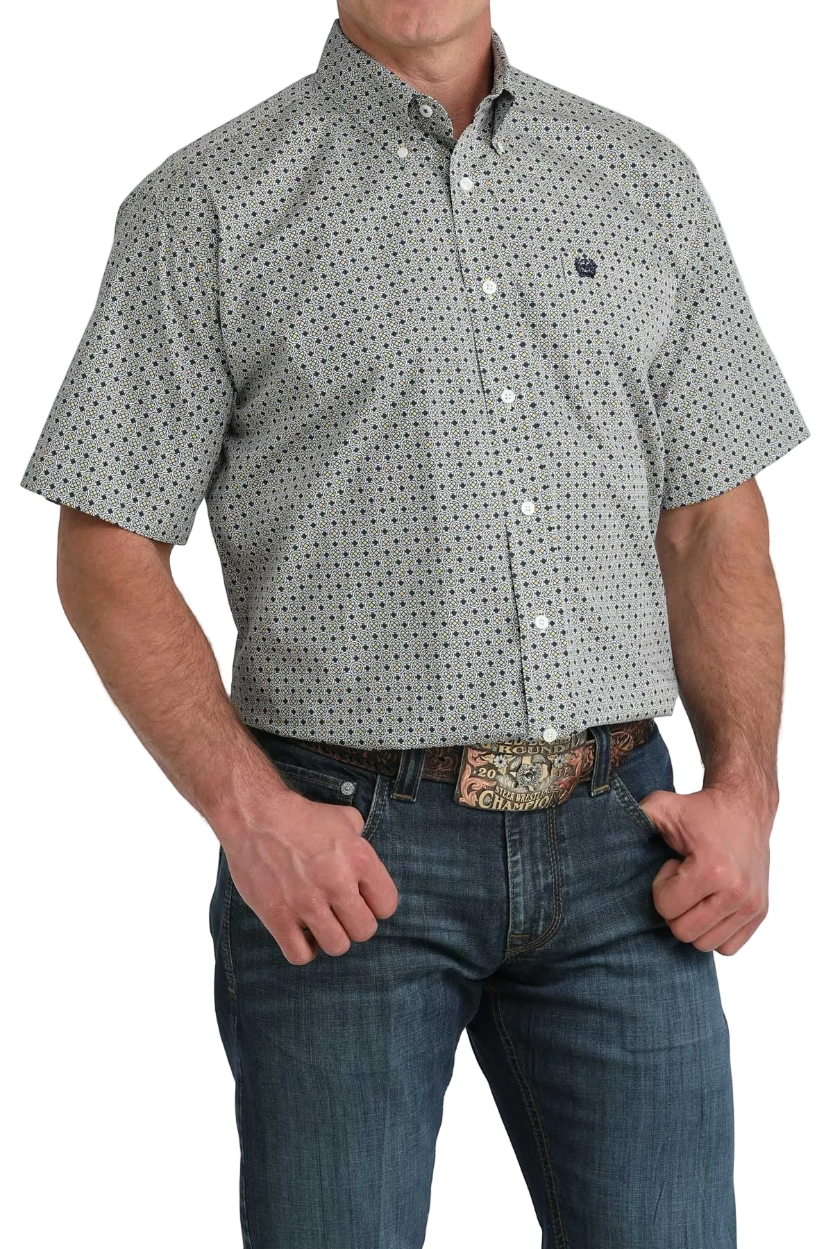 Man wearing a patterned short-sleeve shirt and jeans on a white background