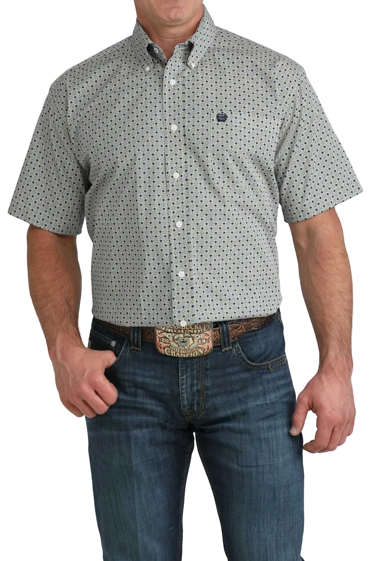 Man wearing a patterned short-sleeve shirt and jeans on a white background