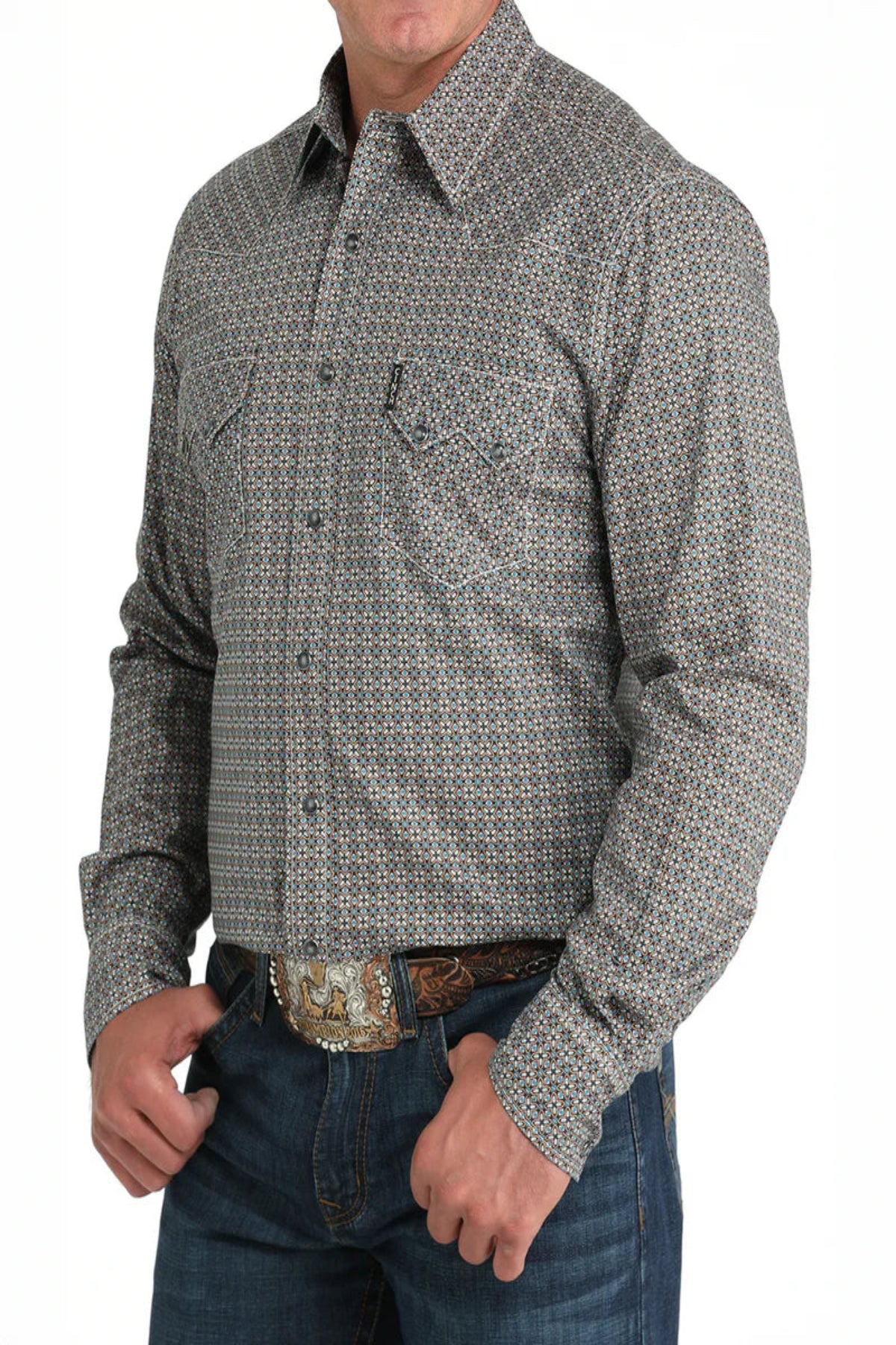 Man wearing a patterned gray shirt with a white background