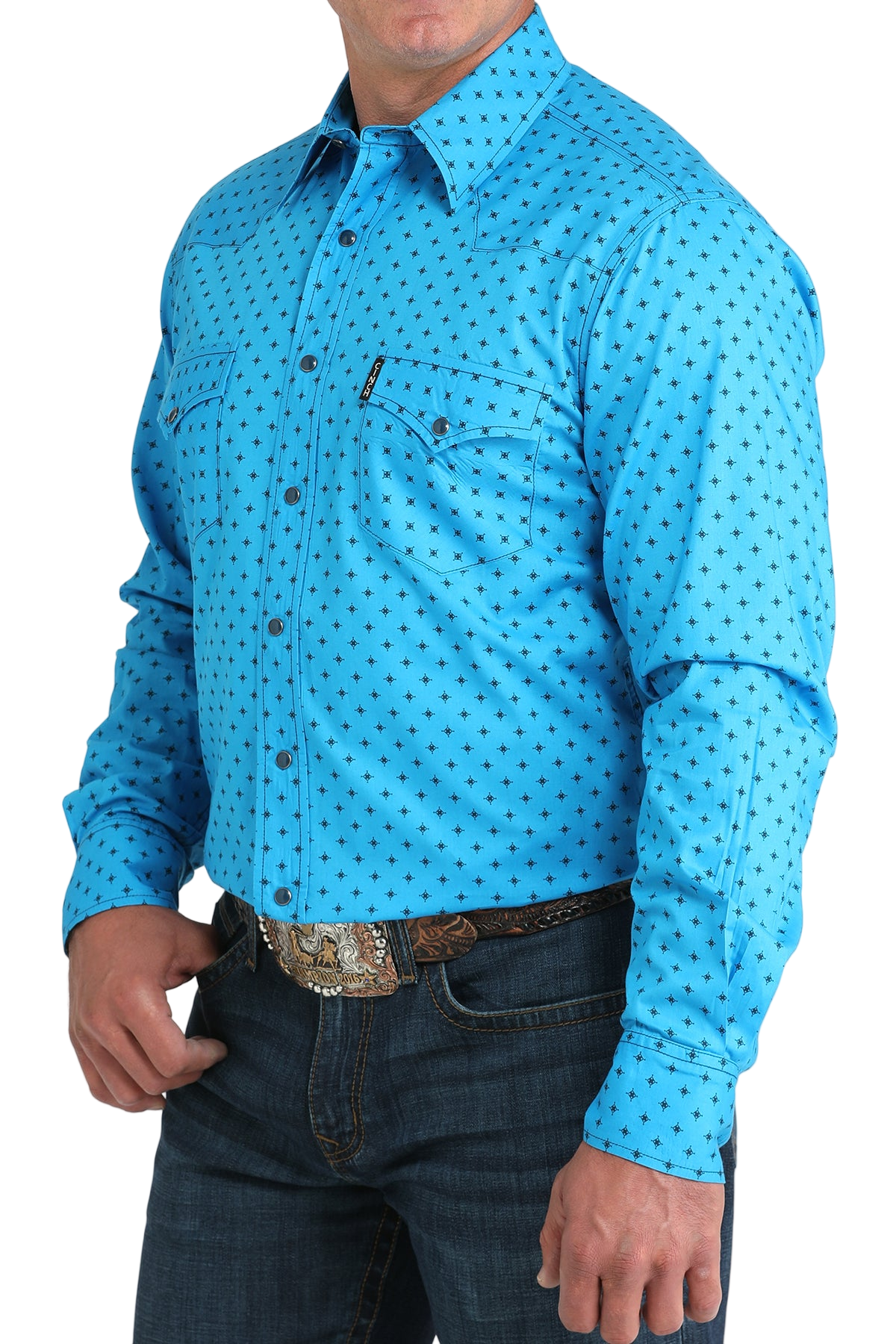 Man wearing a patterned blue long sleeve button-down shirt and jeans on a transparent background