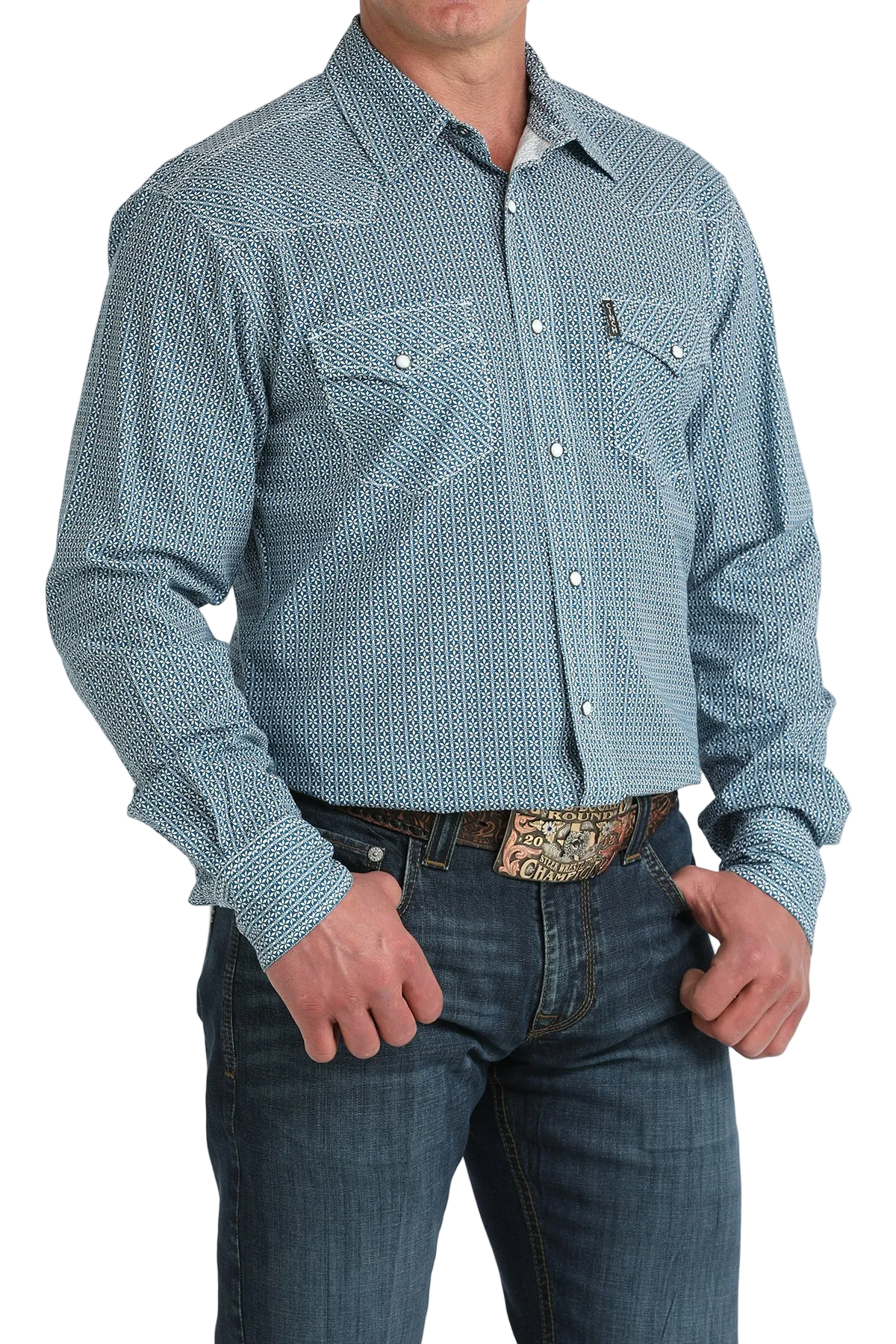 Man wearing a blue patterned button-up shirt and jeans on a white background