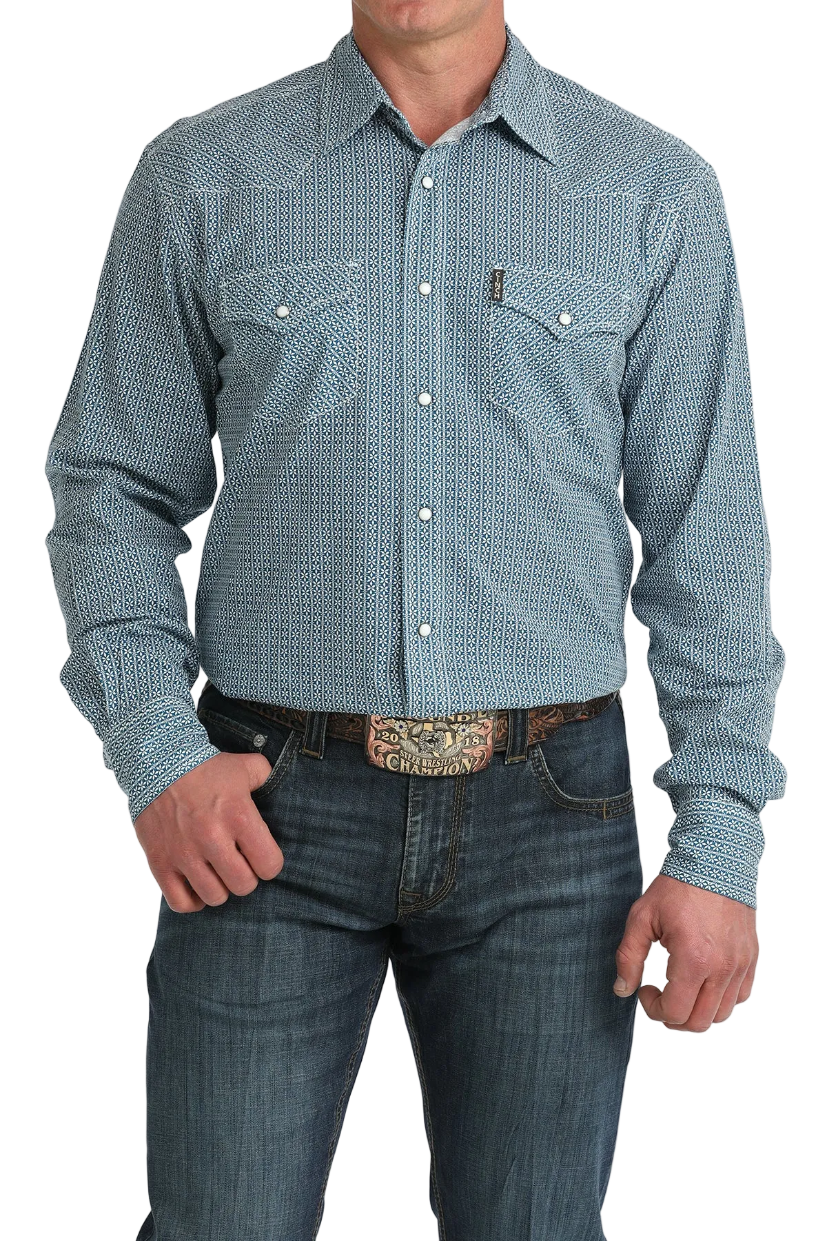 Man wearing a patterned blue shirt and jeans on a white background
