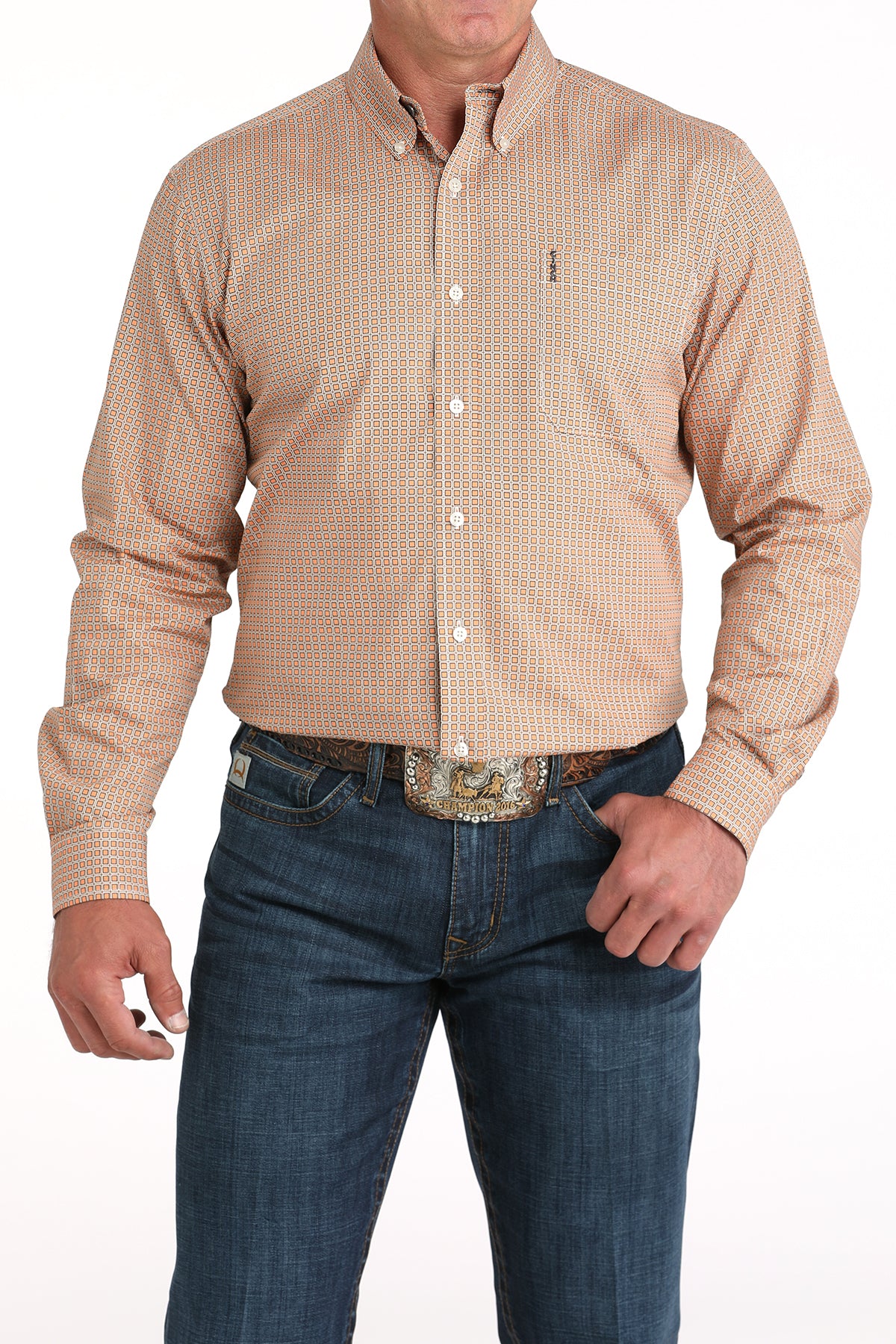 Man wearing a beige checkered shirt and blue jeans on a white background