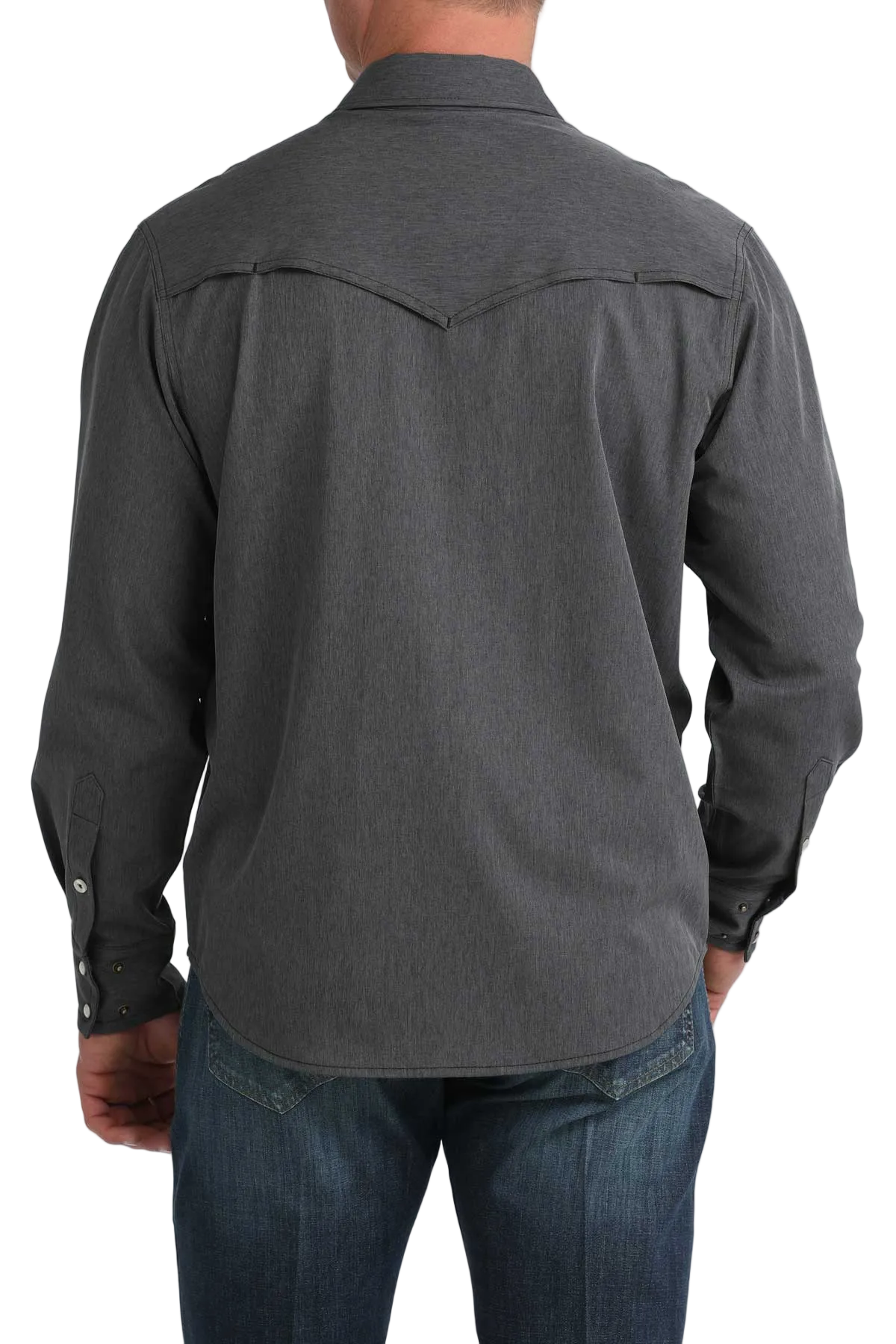 Person wearing a dark gray long-sleeve shirt and blue jeans on a white background