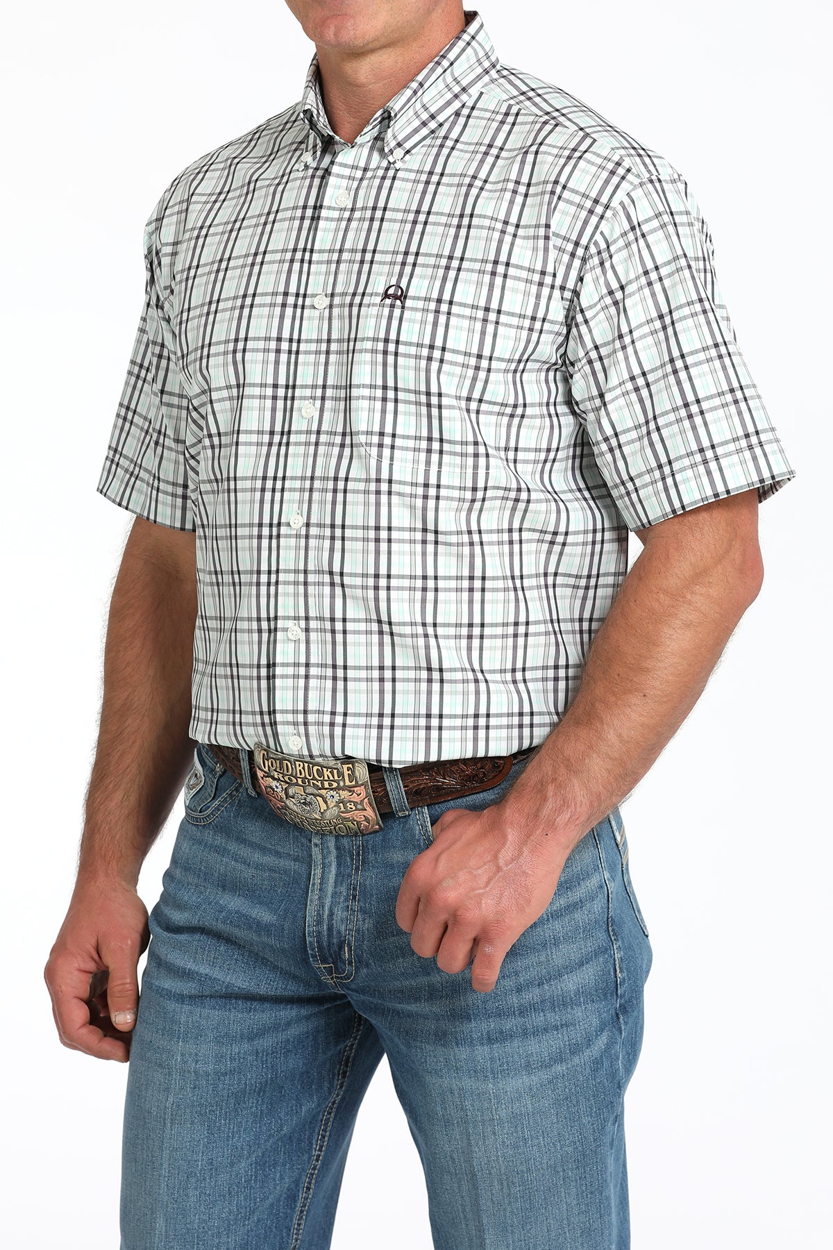 Man wearing a plaid shirt and jeans on a white background