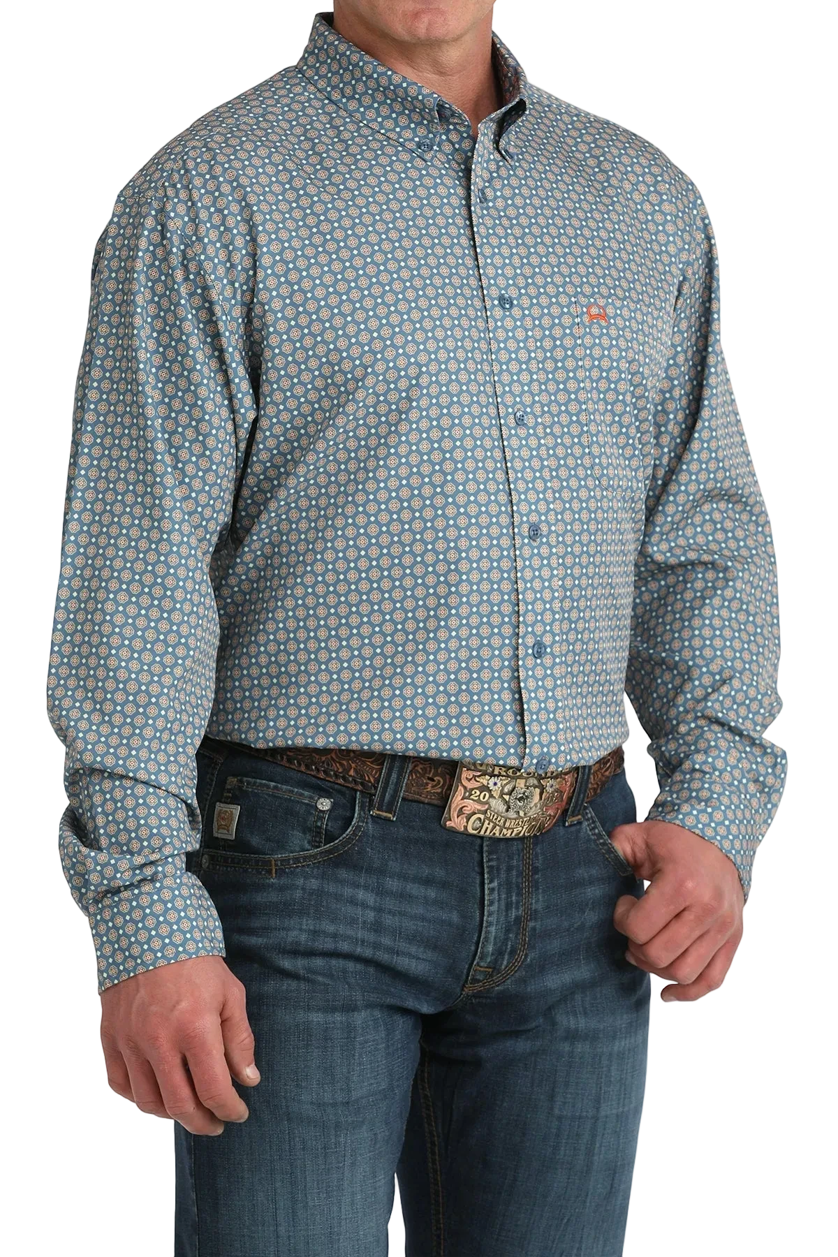 Man wearing a patterned button-up shirt and jeans on a white background