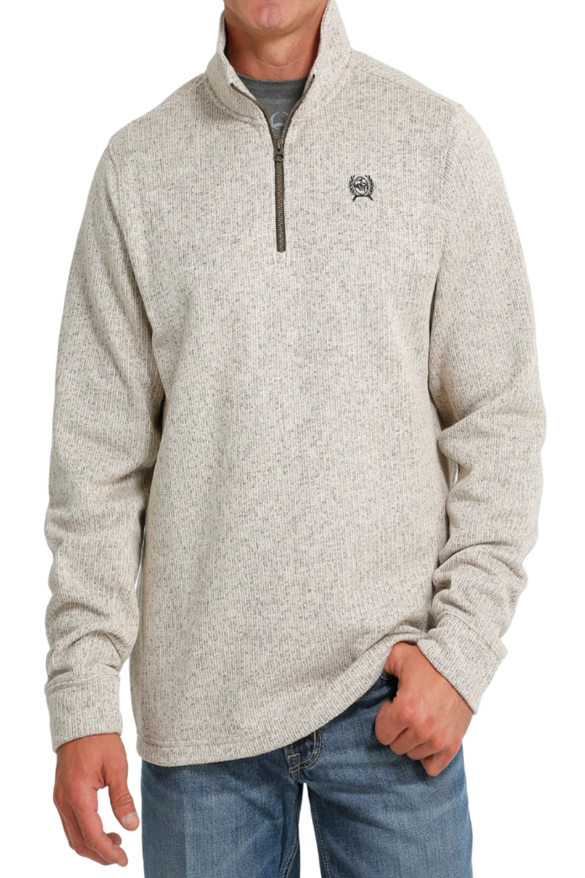 Man wearing a beige half-zip sweater with a logo on a white background