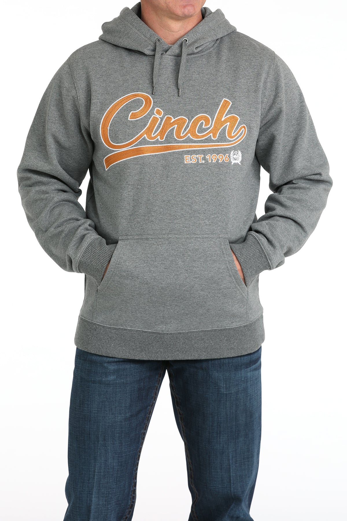Person wearing a gray hoodie with 'Cinch' logo on a white background