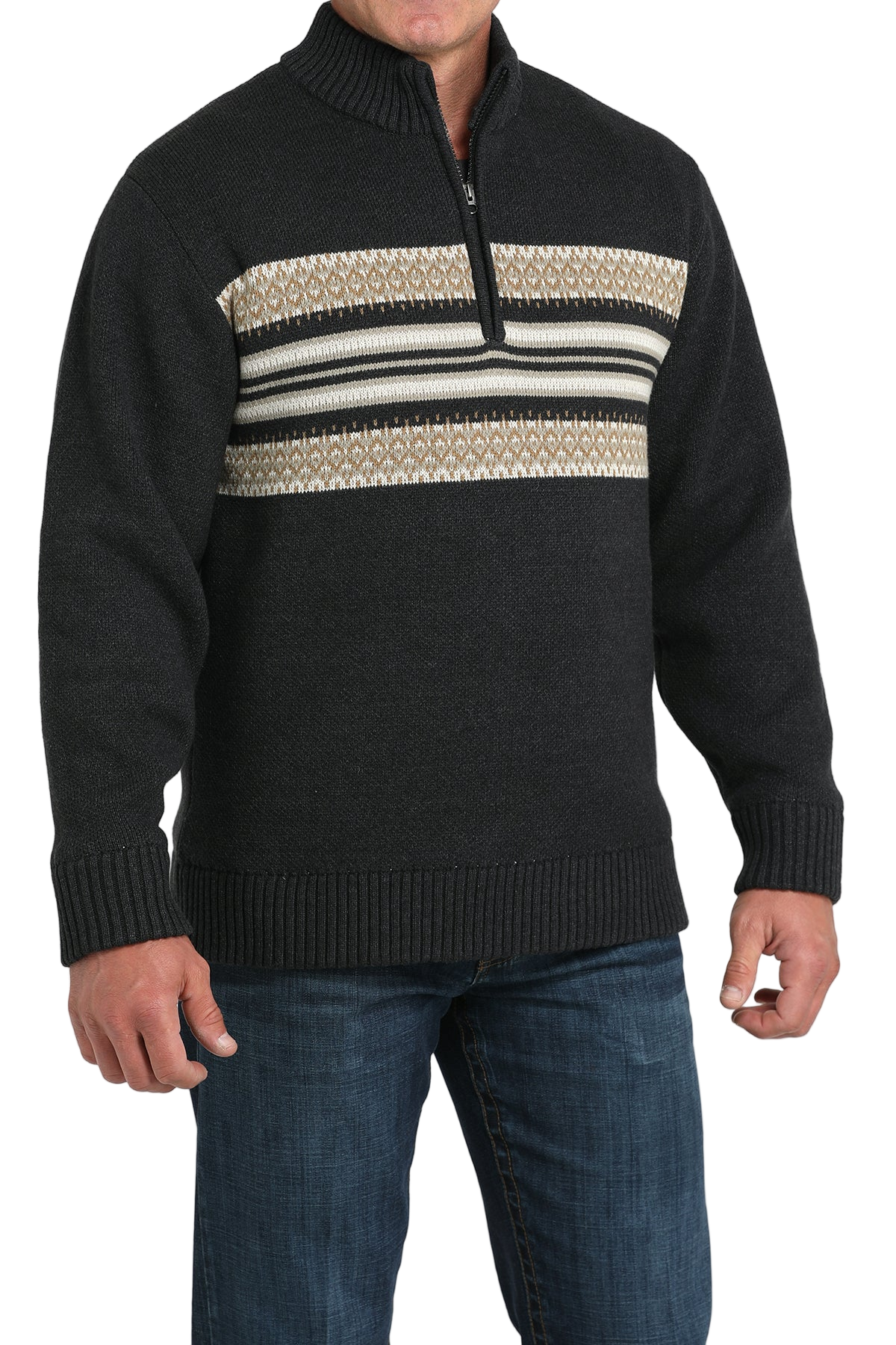 Black sweater with patterned chest area worn by a person on a white background