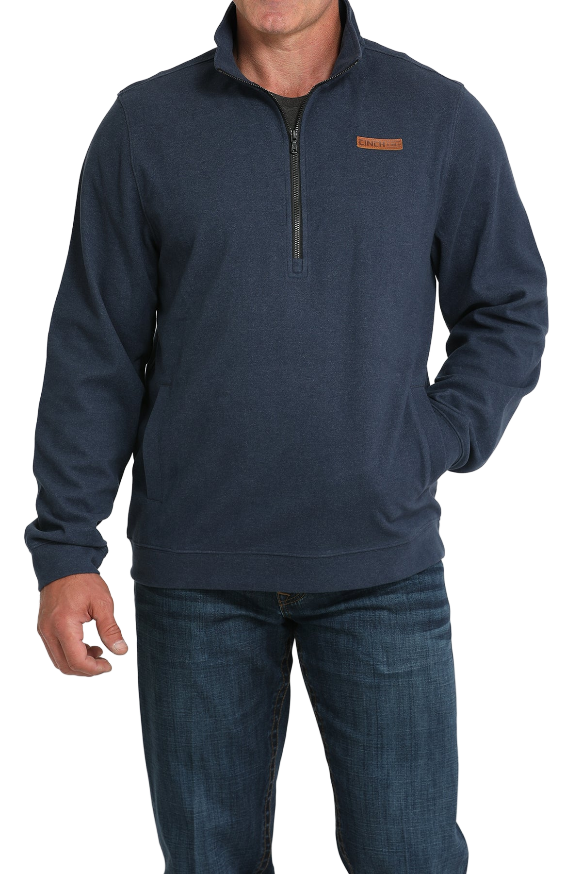 Man wearing a blue pullover with a small logo on a white background