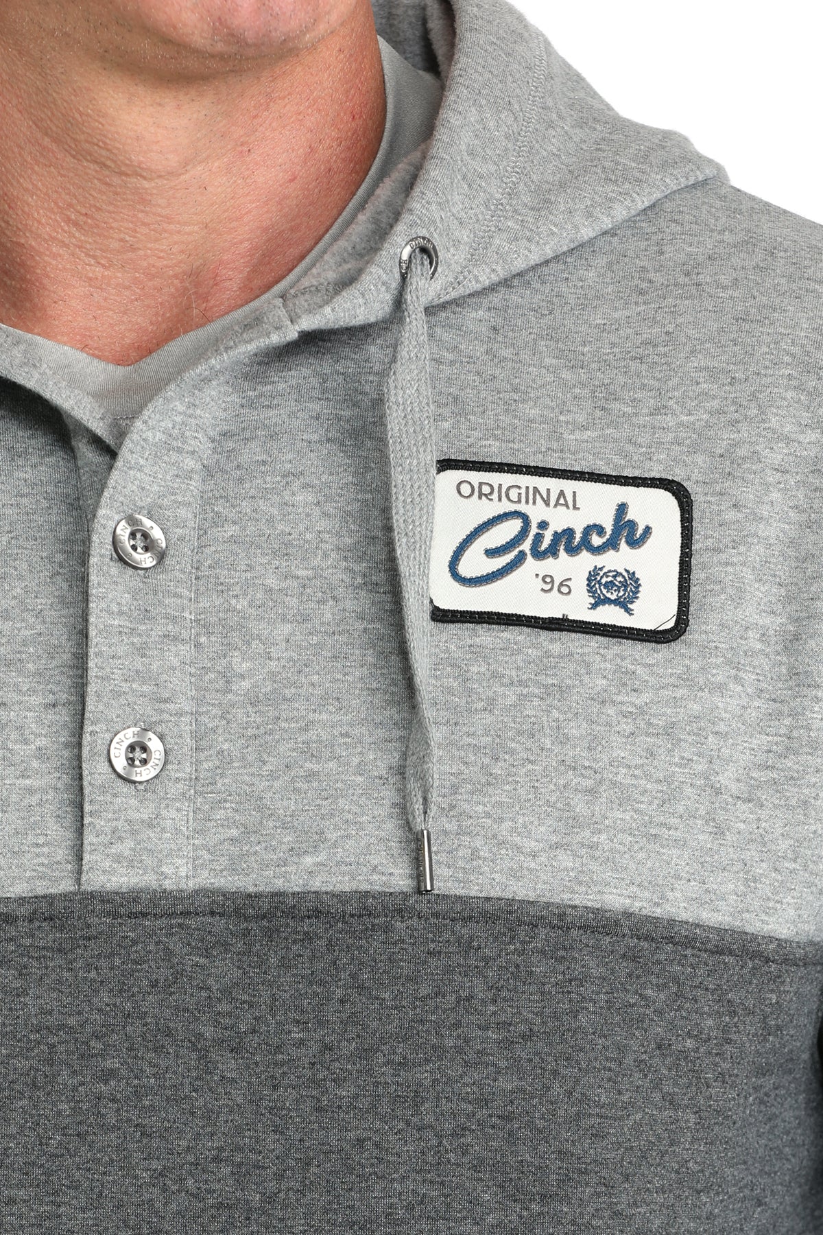 Gray and black pullover with Cinch logo on a white background