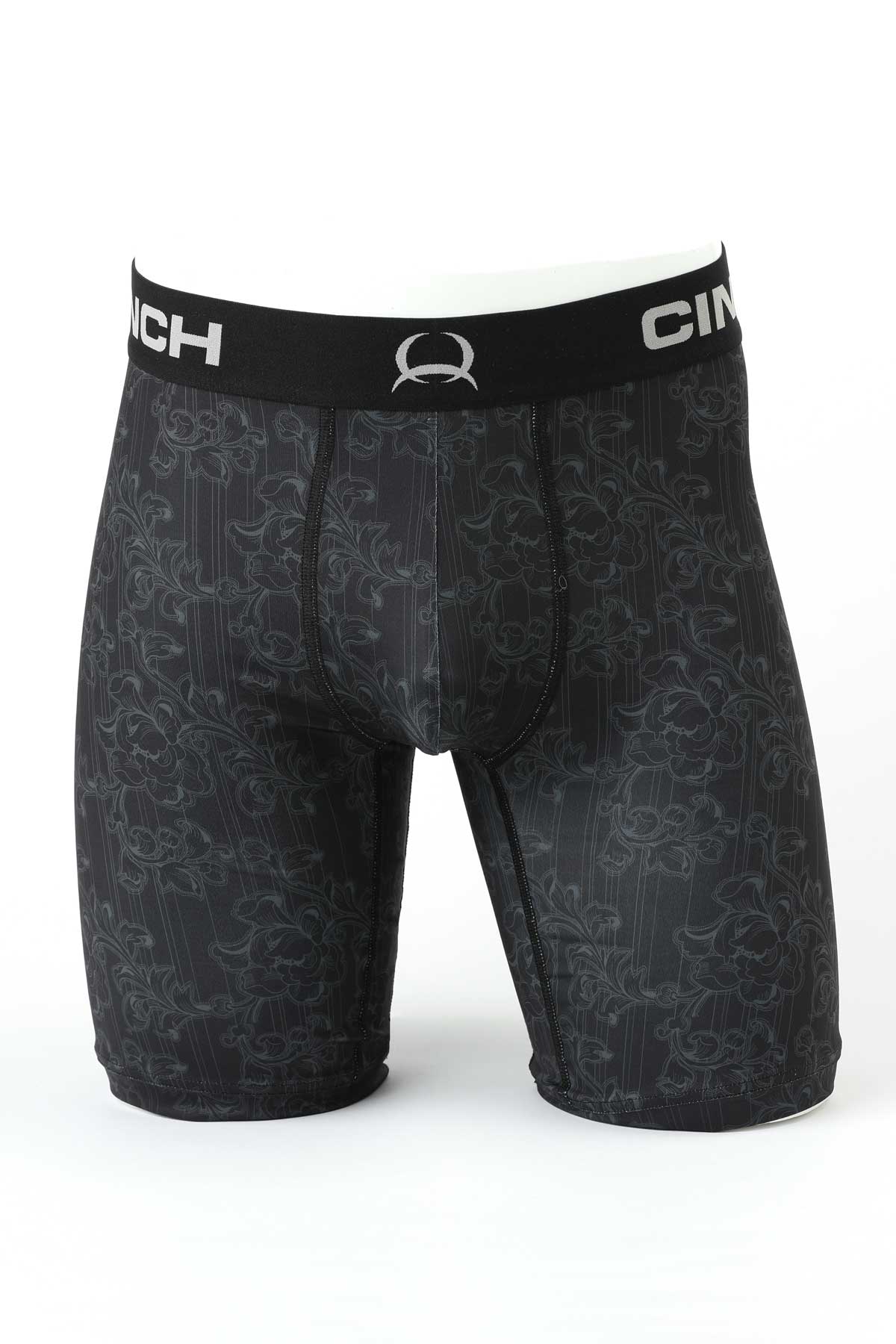 Front view of Cinch men’s 9-inch boxer briefs in black floral print with black Cinch waistband on mannequin